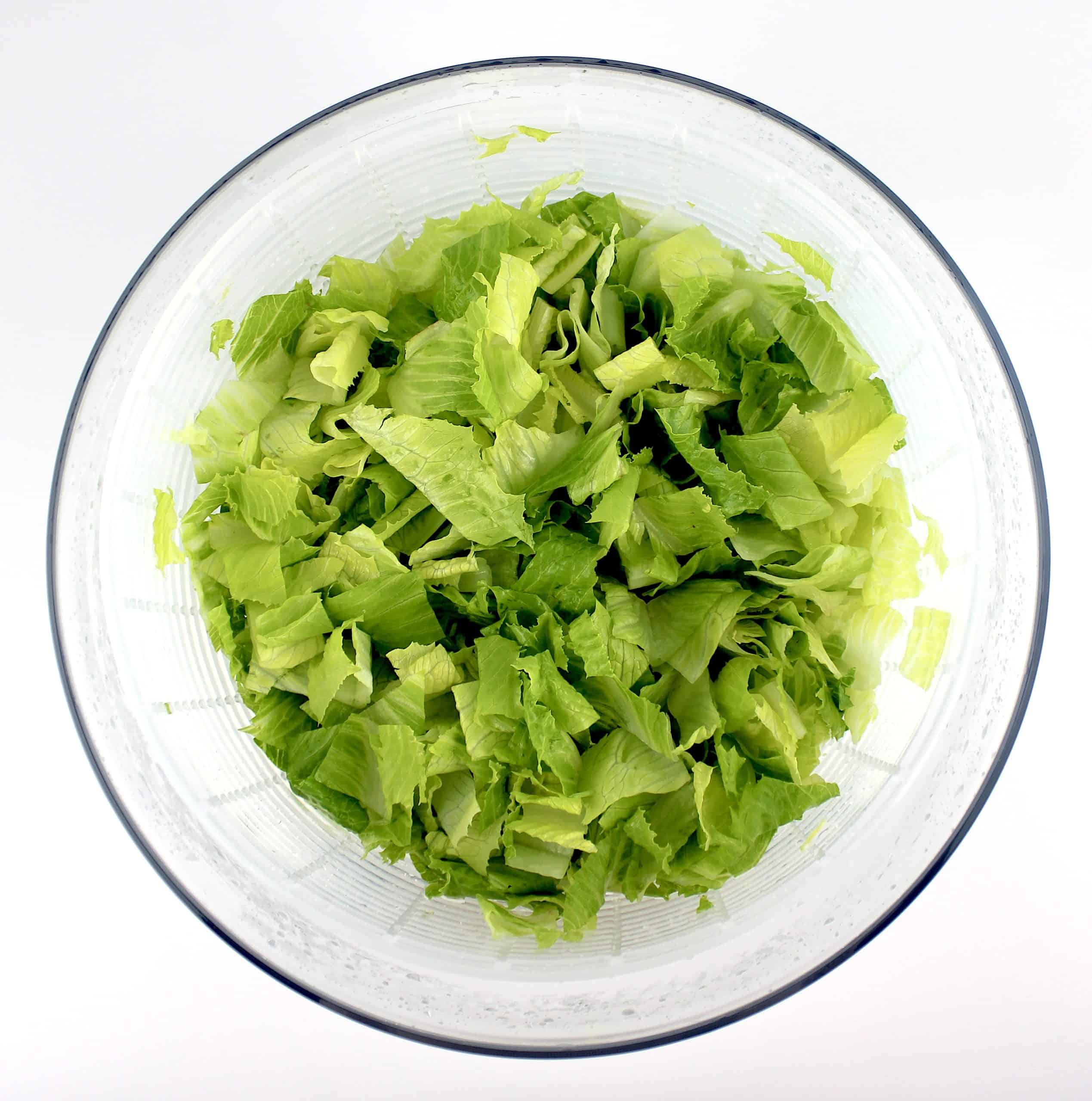 chopped lettuce in salad spinner
