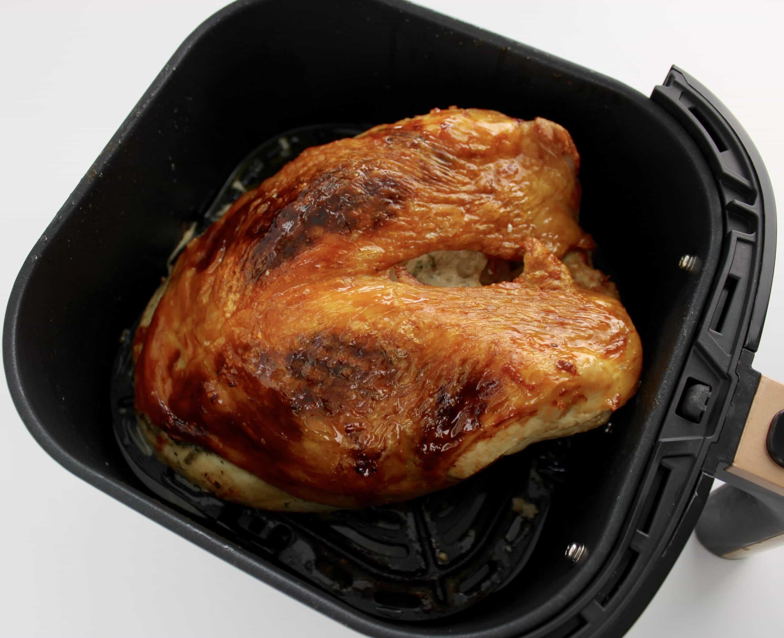 cooked Air Fryer Turkey Breast in basket
