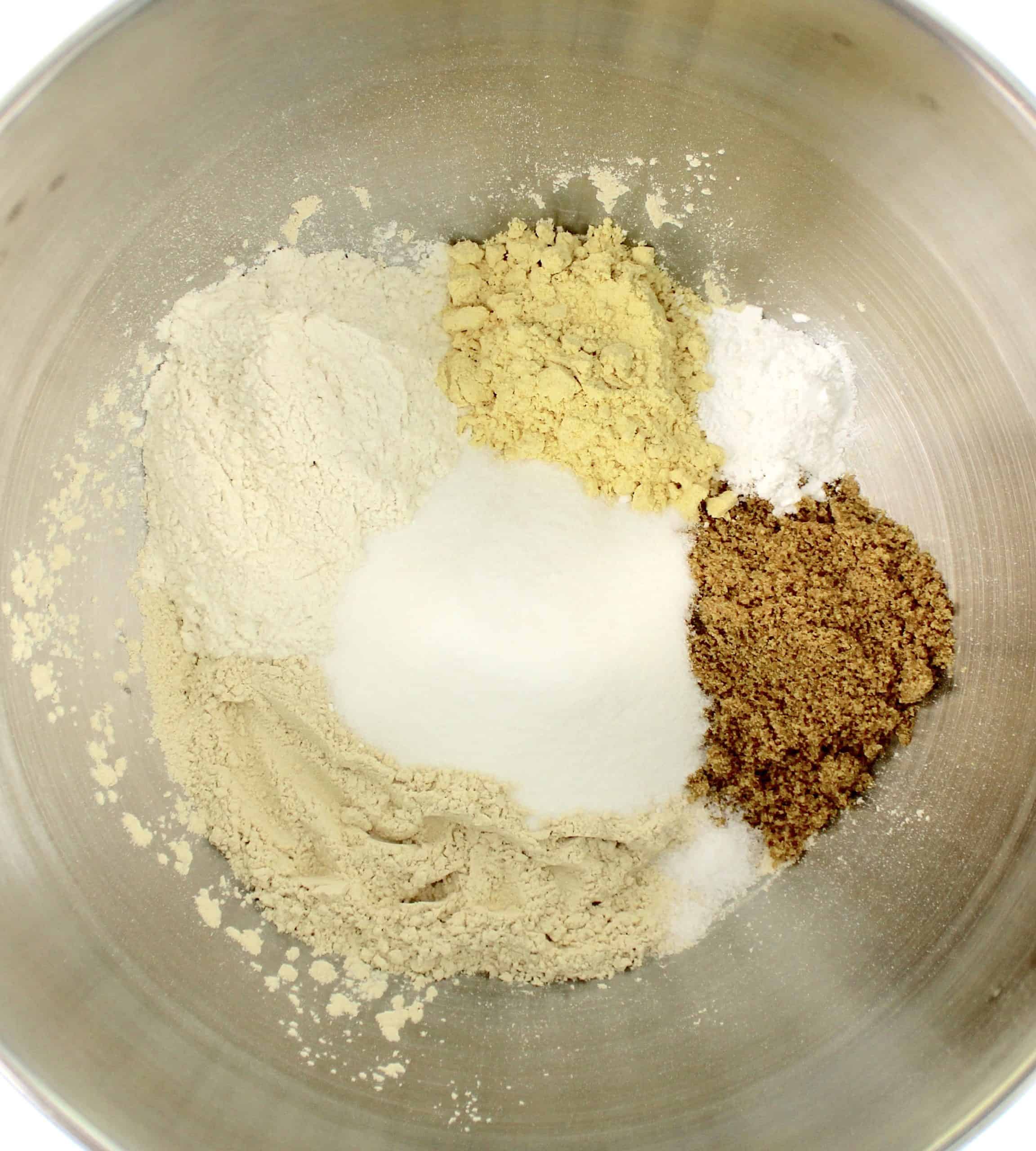 dry ingredients for cinnamon roll dough in mixing bowl
