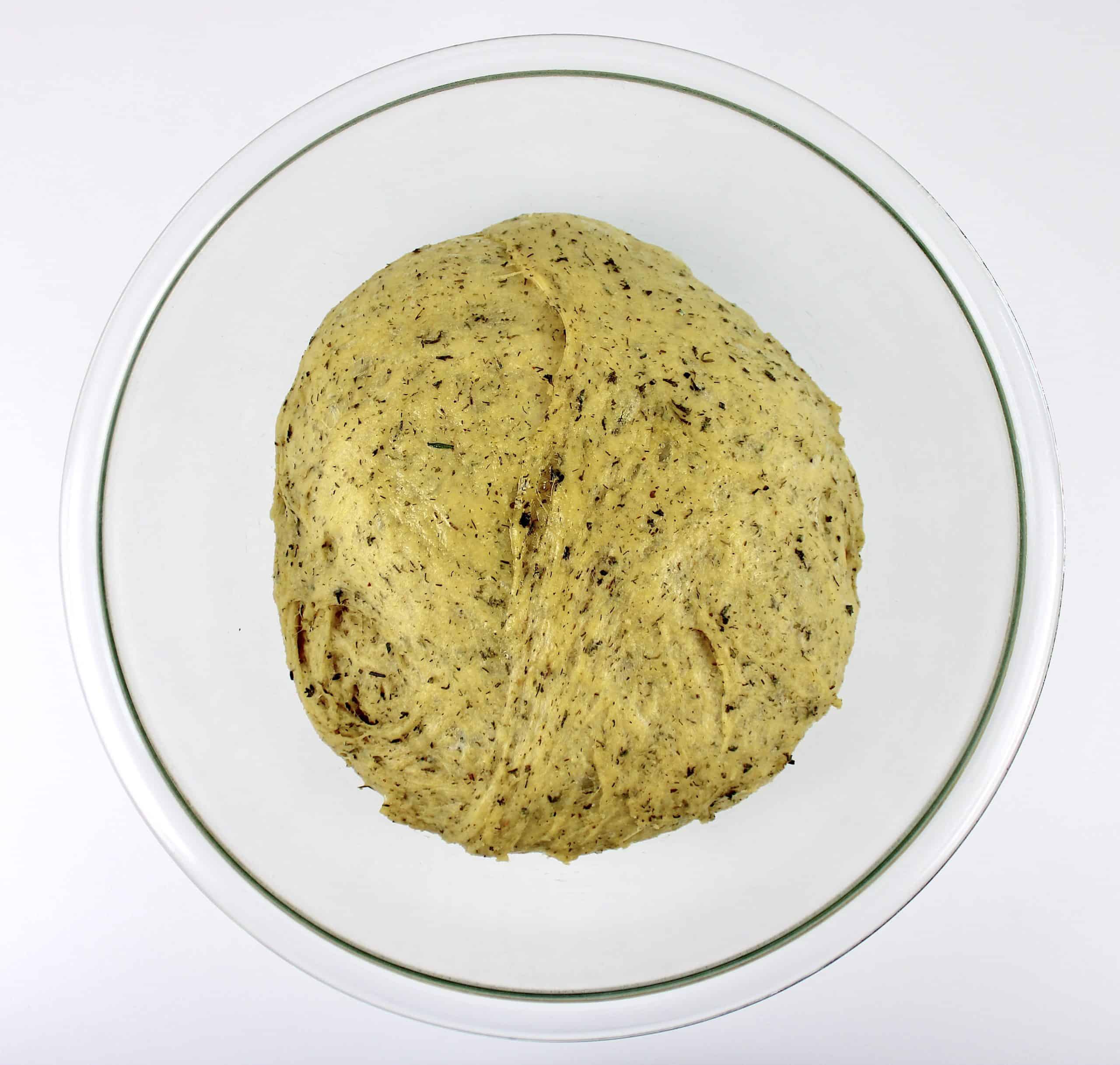 Keto Braided Herb Bread dough ball in glass mixing bowl