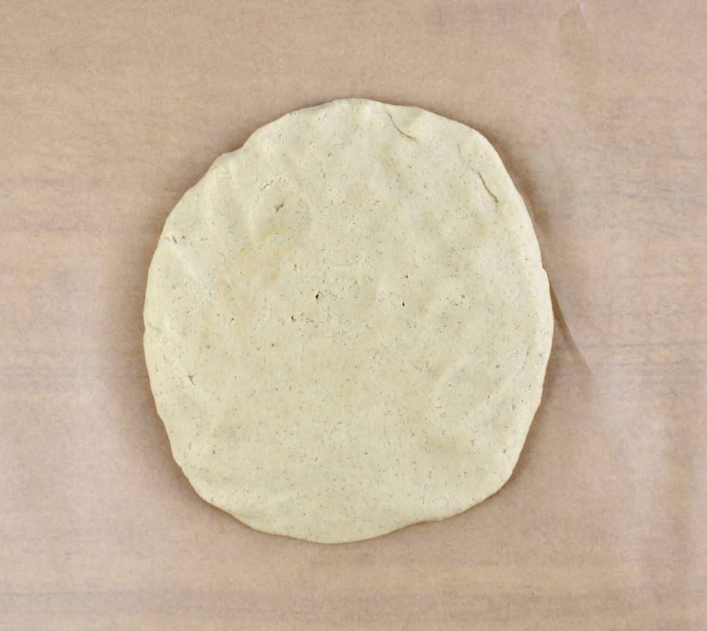 Keto Vanilla Wafers dough in disc on parchment paper