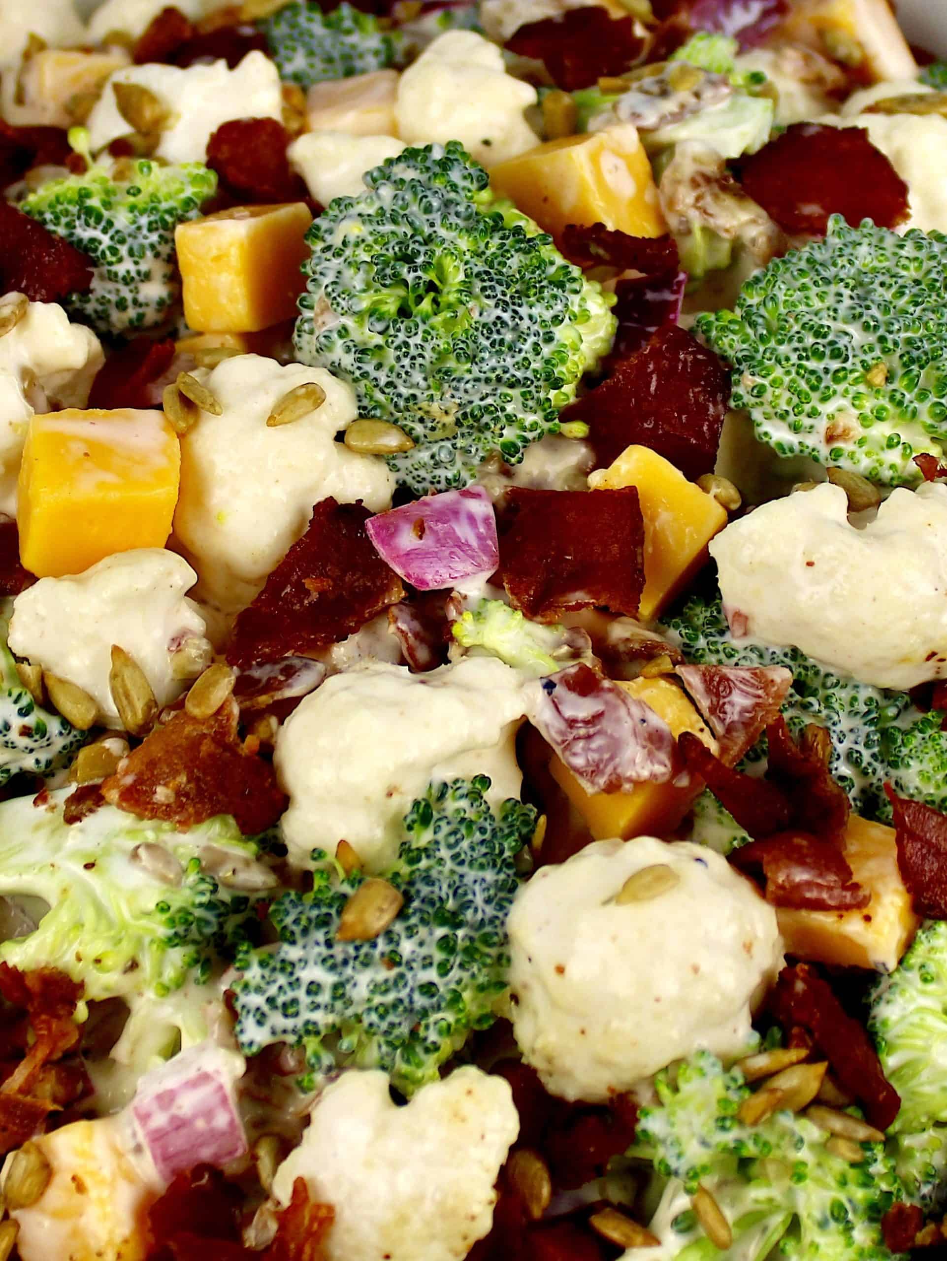 closeup of Broccoli Cauliflower Salad in white bowl