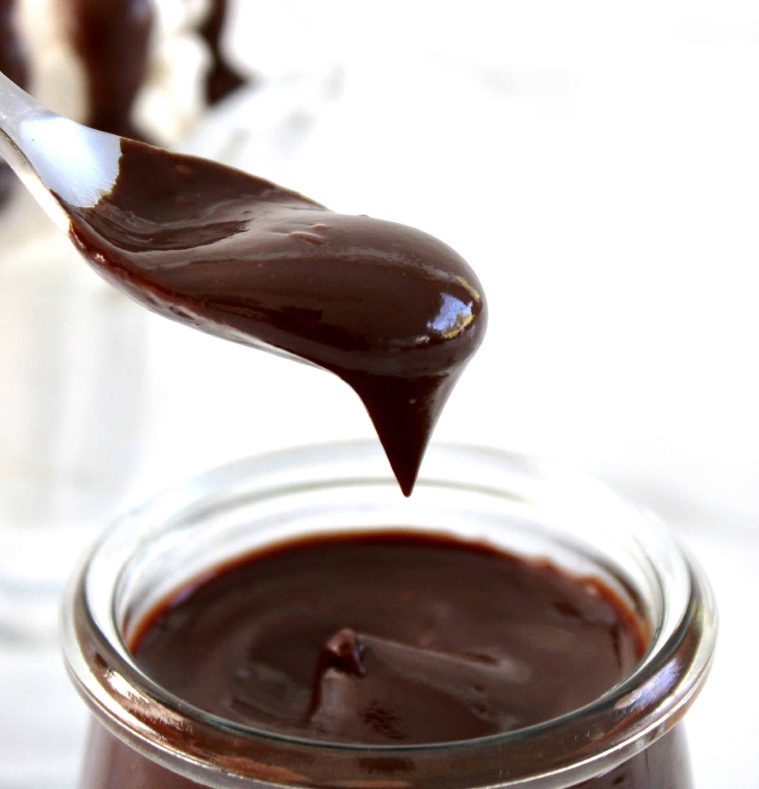 Keto Chocolate Sauce dripping off spoon