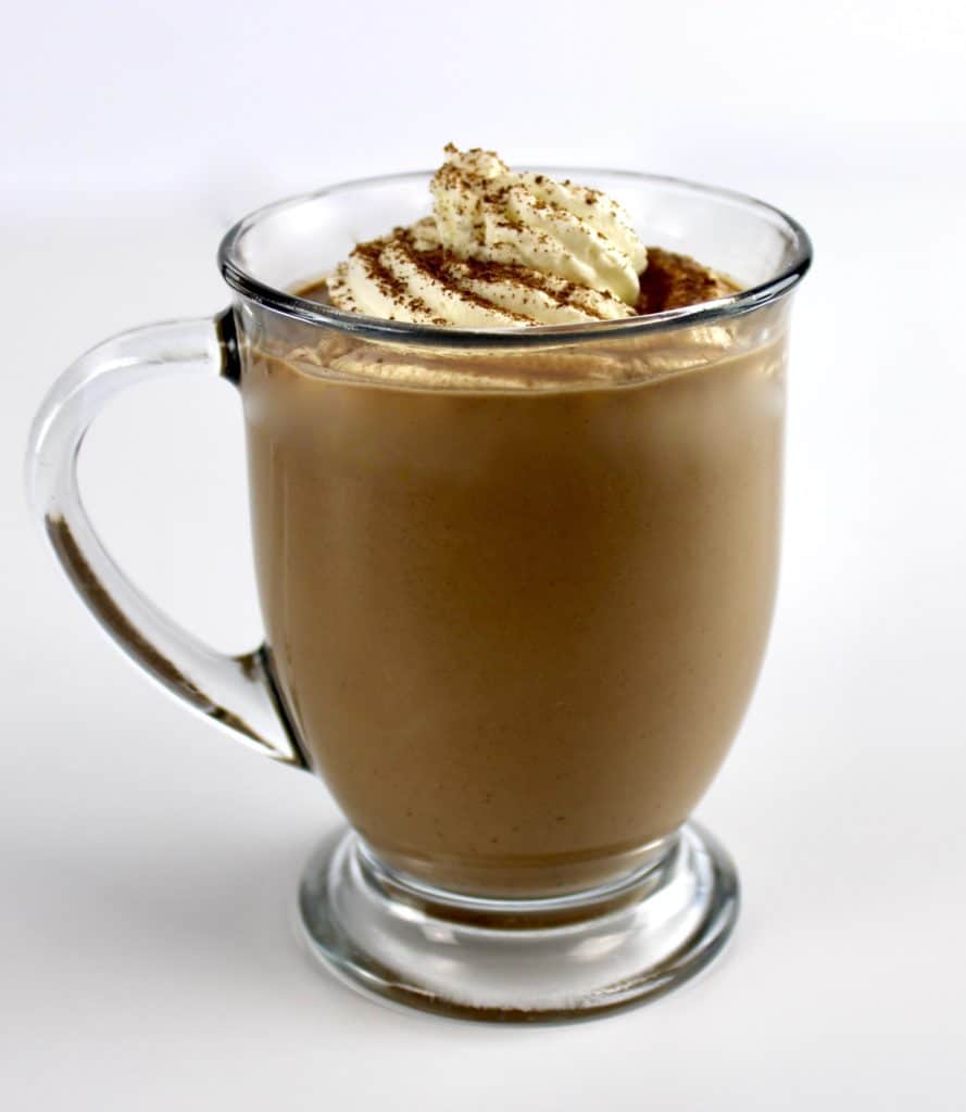 Keto Hot Chocolate in glass mug with whip cream on top