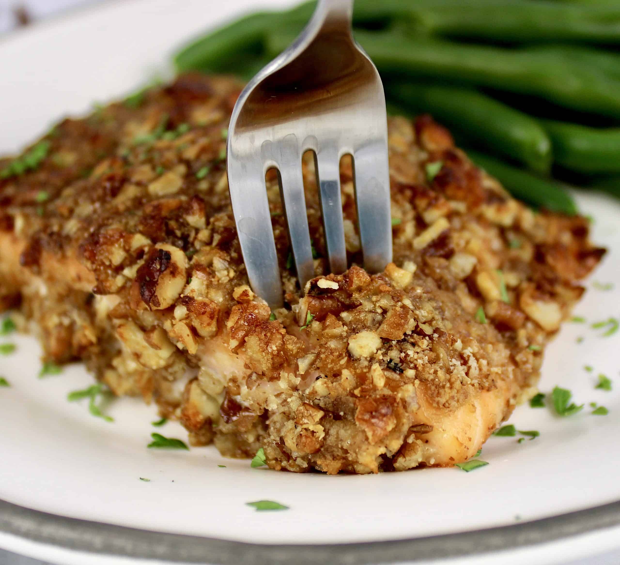 Pecan Crusted Salmon with fork digging in