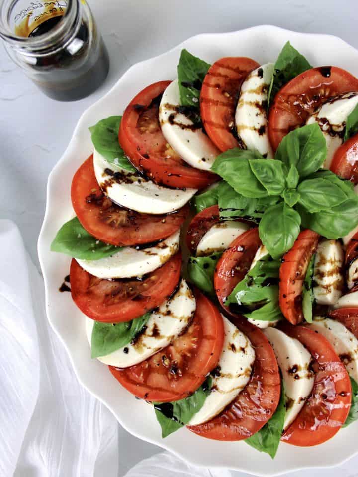 caprese salad with balsamic drizzle on top