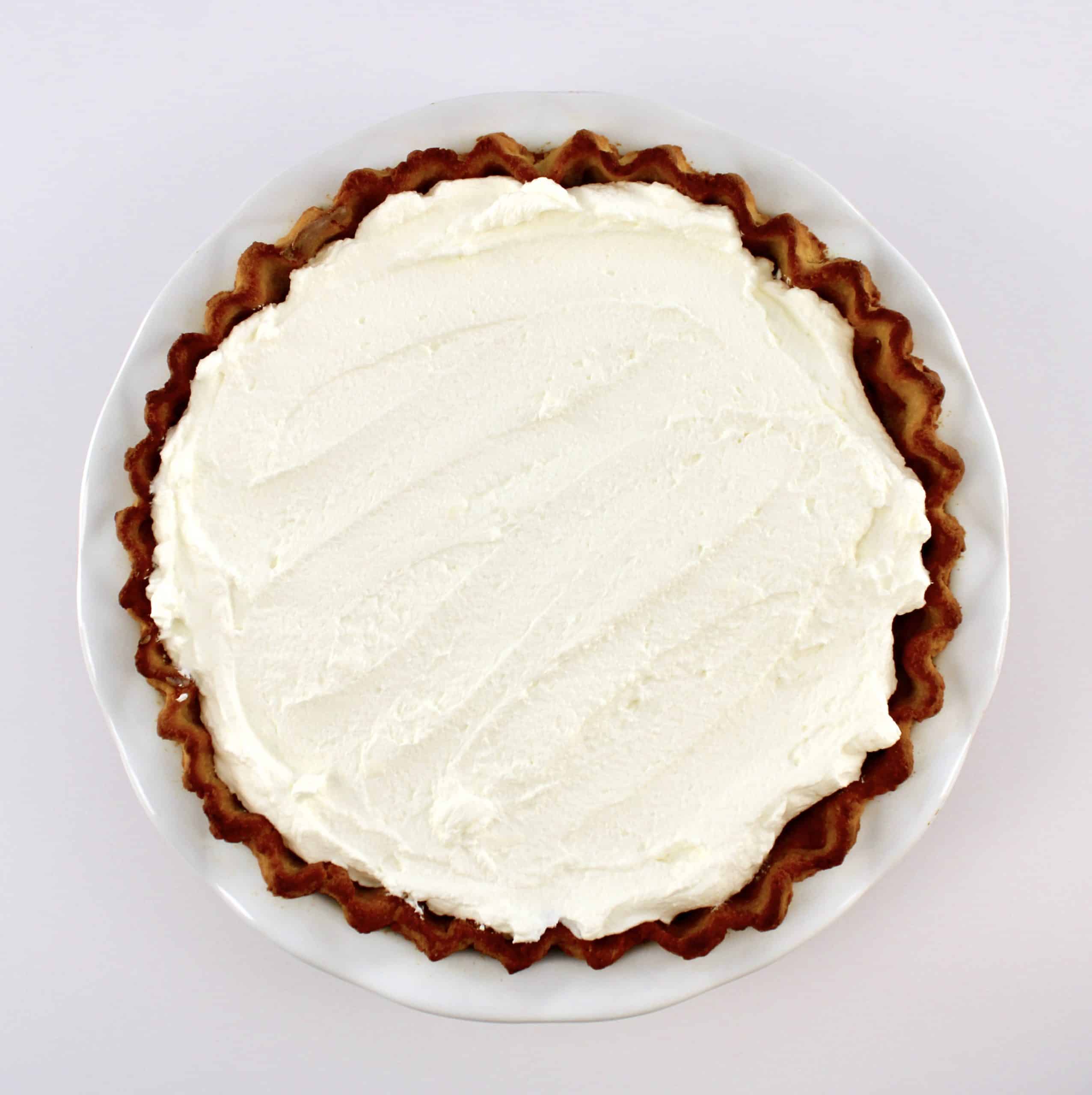 chocolate cream pie with whip cream on top