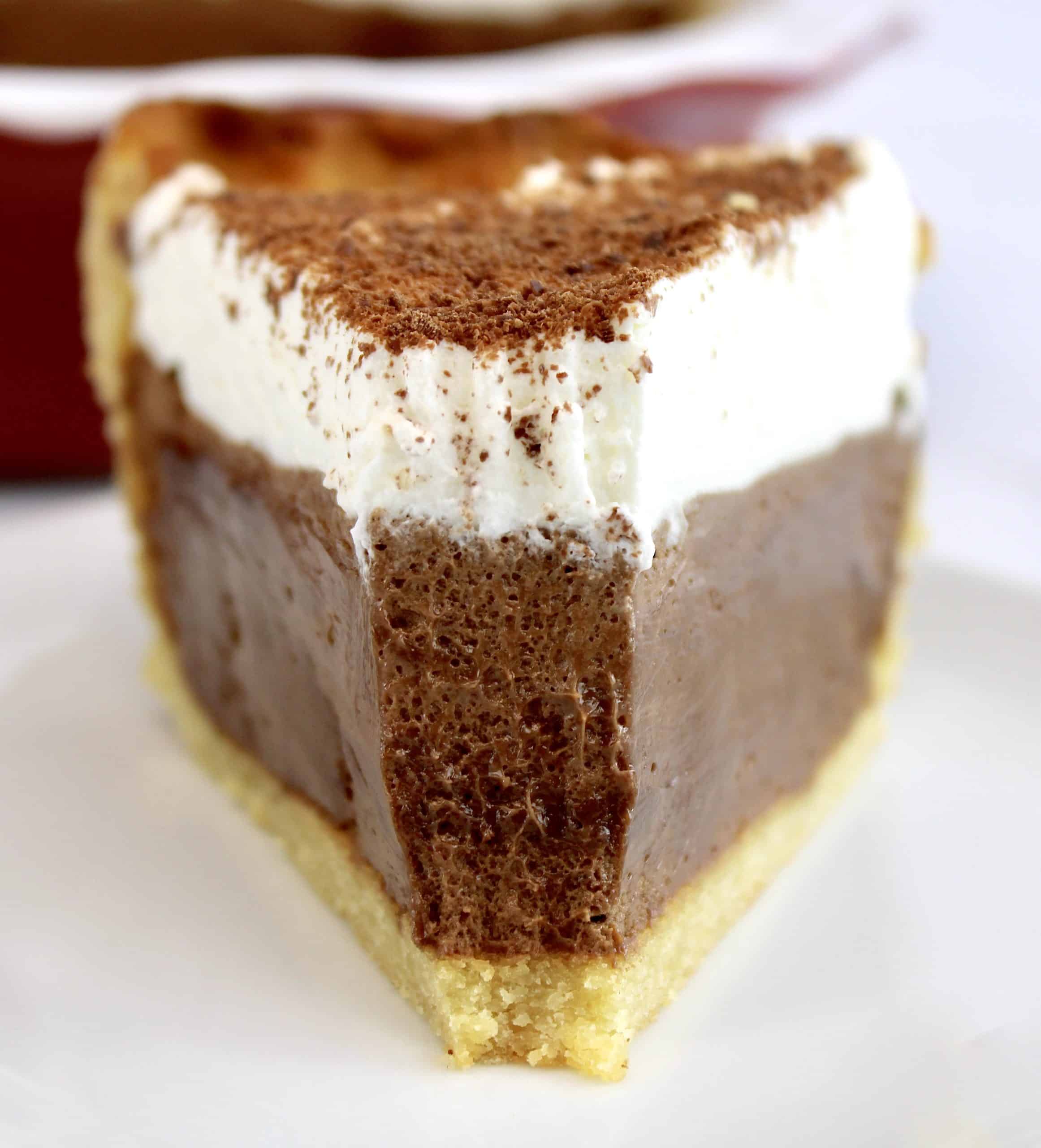 closeup of piece of french silk pie with bite missing