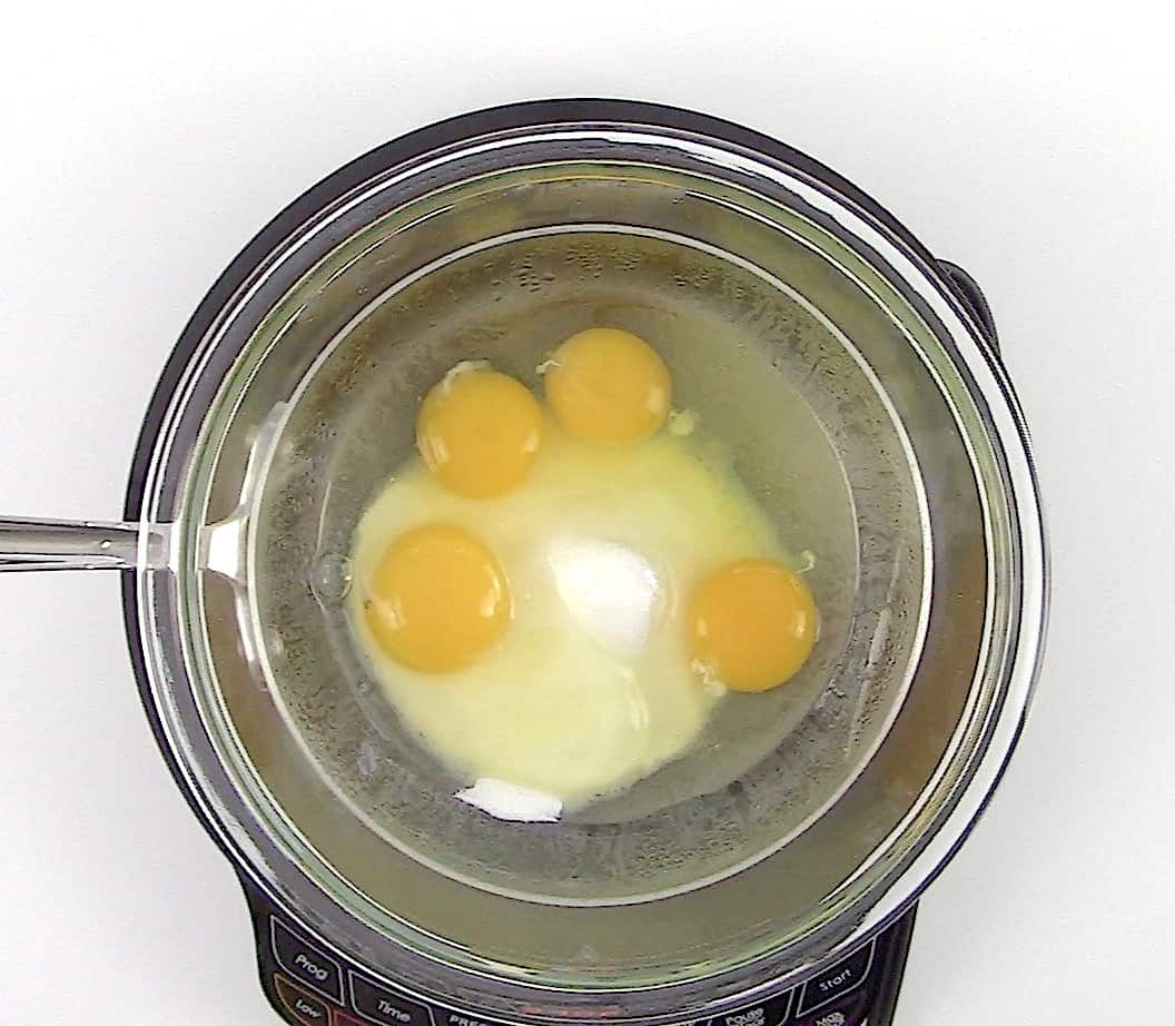 4 eggs and sweetener in double boiler
