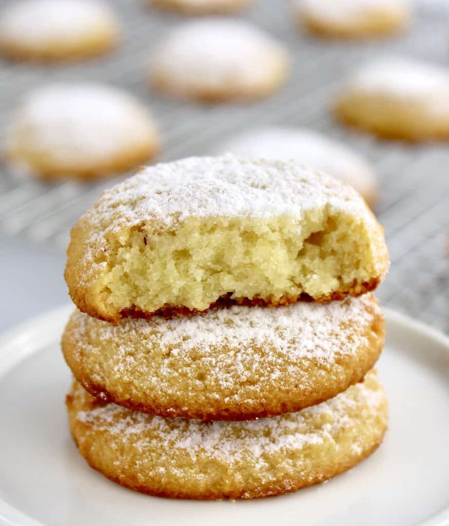 3 Cream Cheese Cookies stacked up with bite taken out