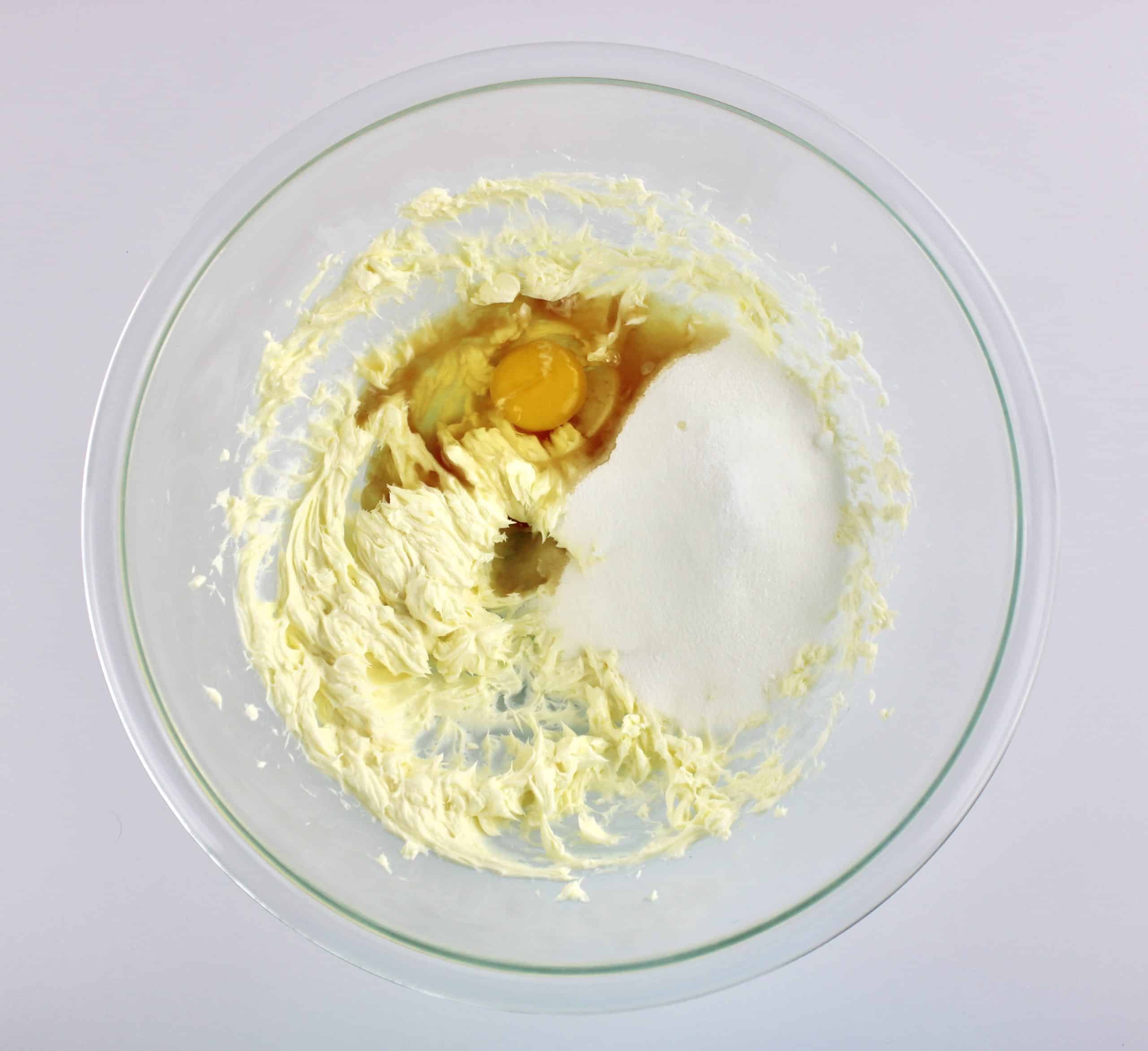 eggs butter and sugar in glass bowl