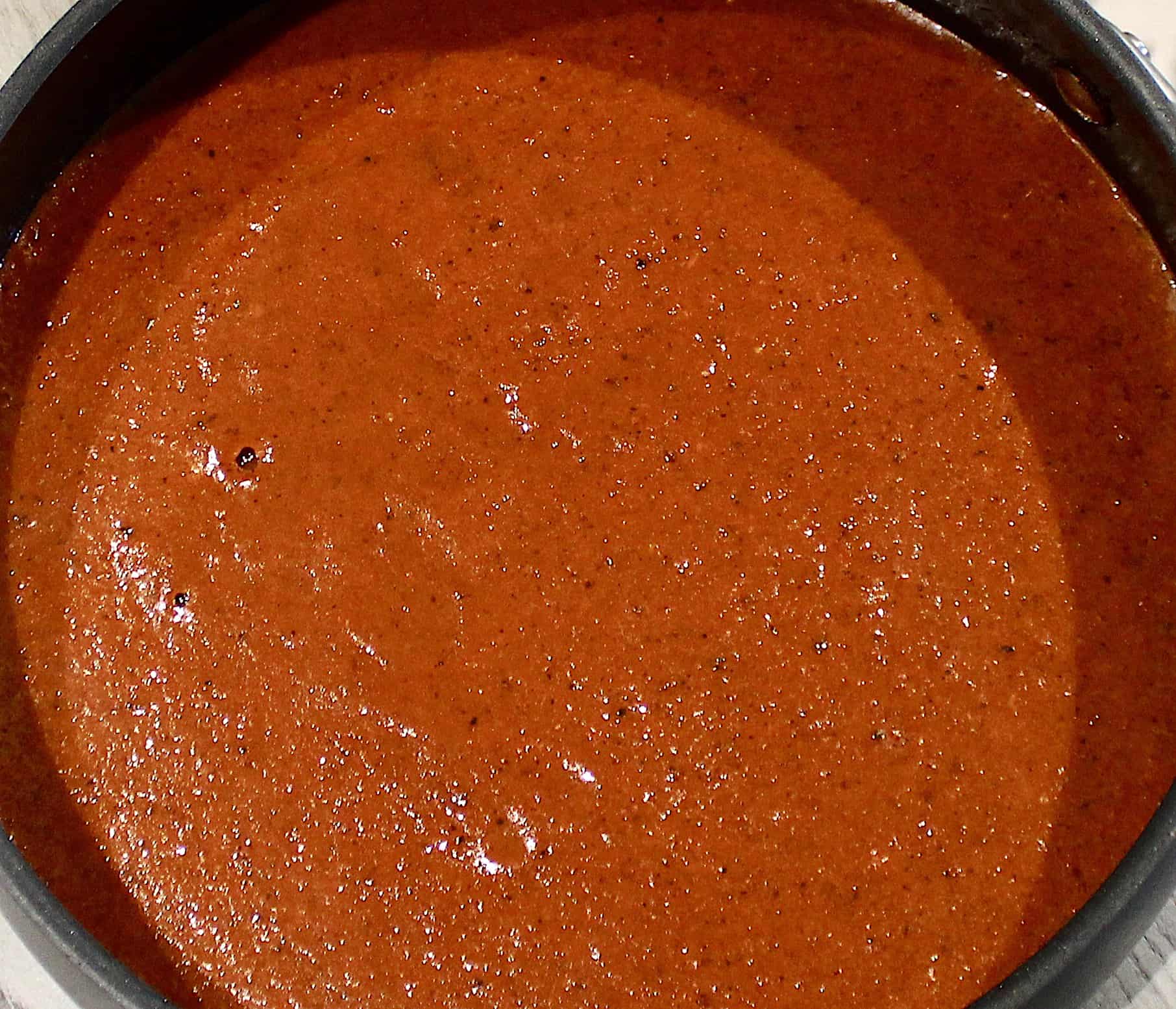 Keto Enchilada Sauce cooked in saucepan