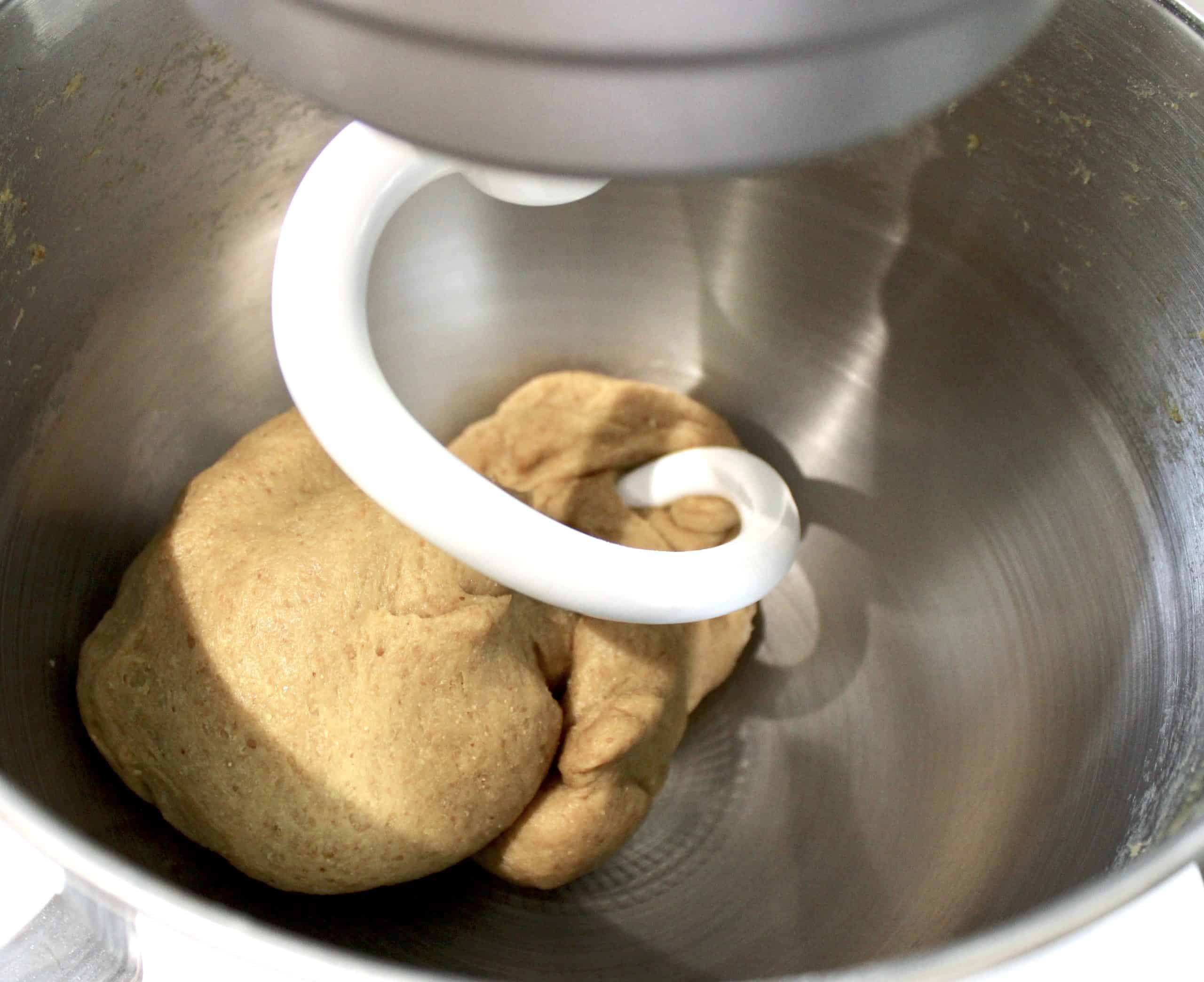 keto garlic rolls dough in stand mixer with dough hook