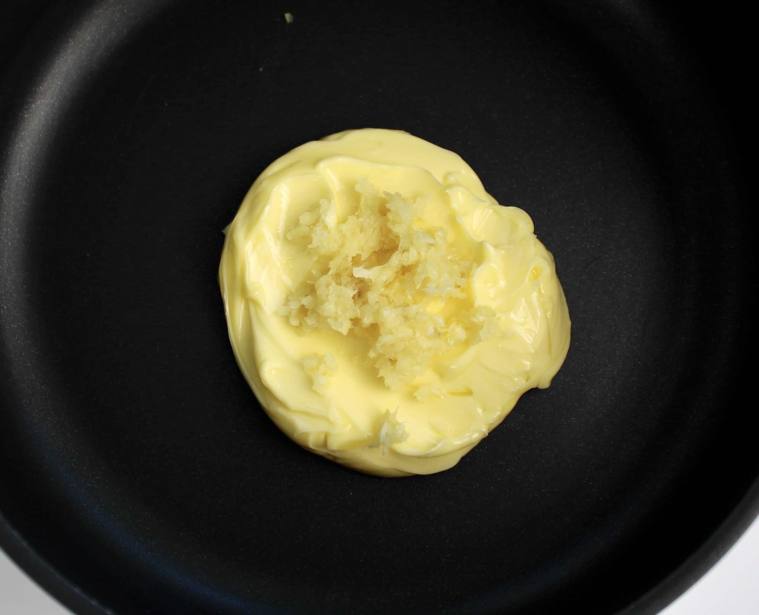 garlic and butter in saucepan