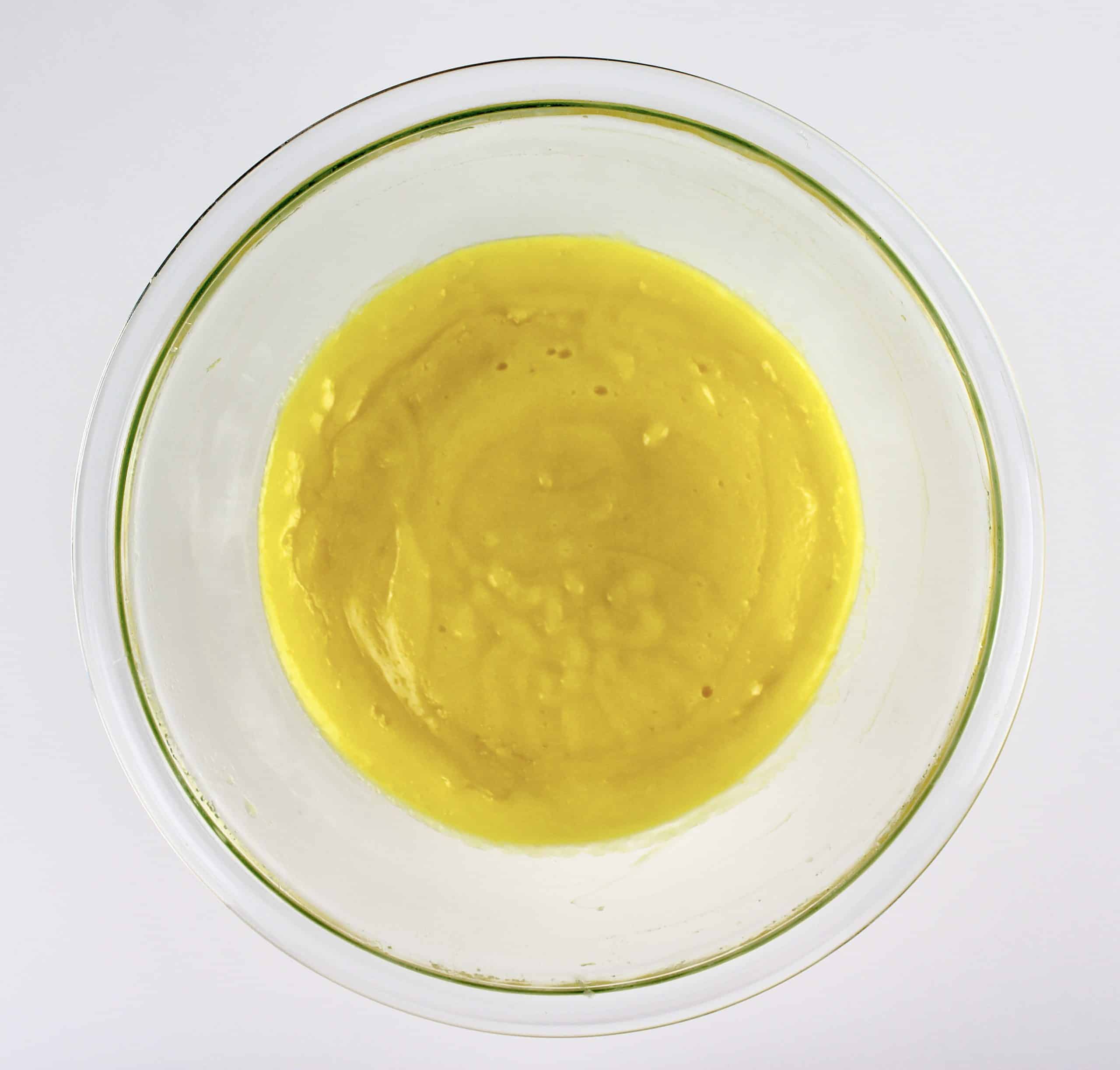 fully cooked lemon curd in glass bowl