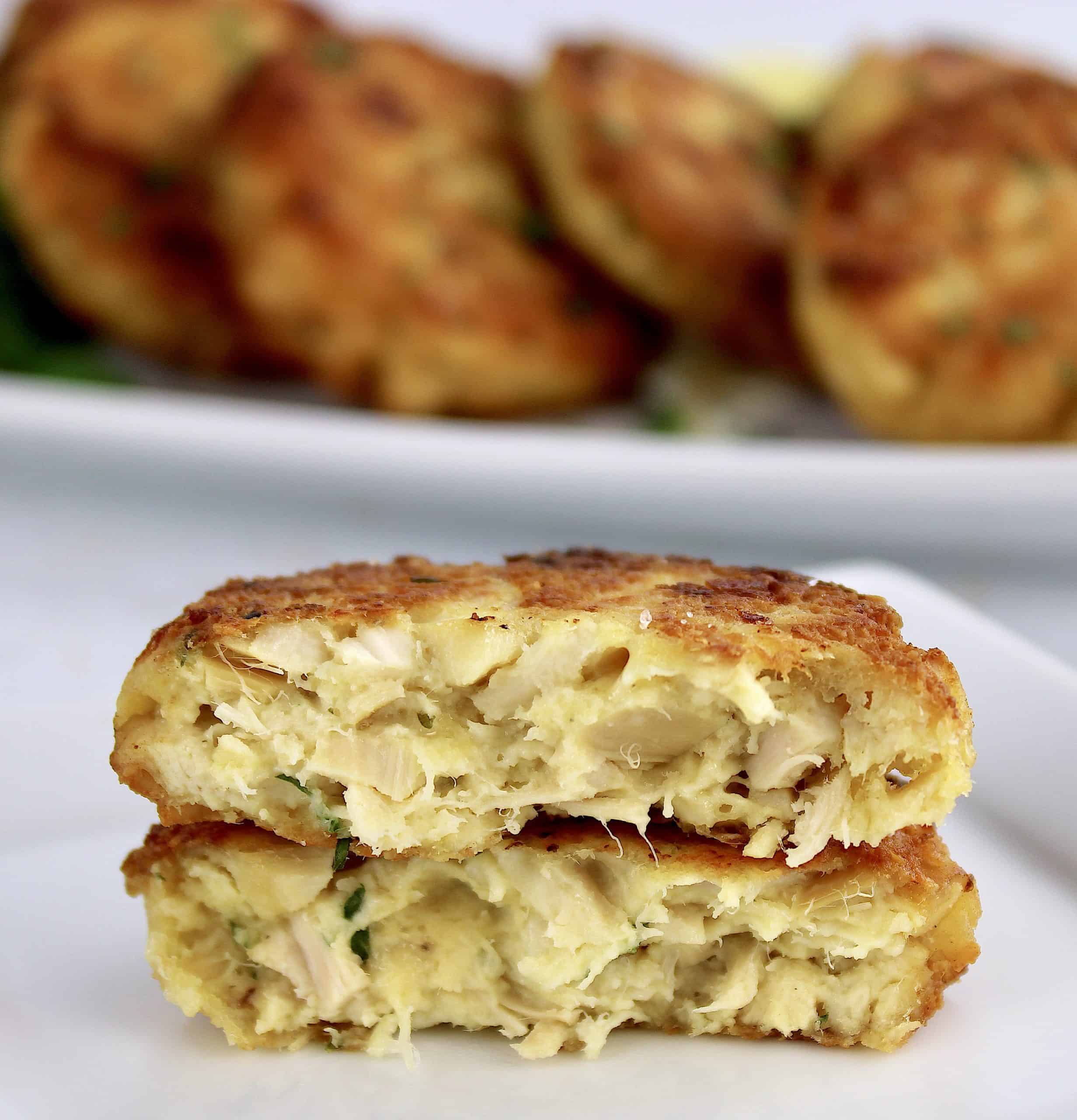 chicken pattie cut in half on white plate