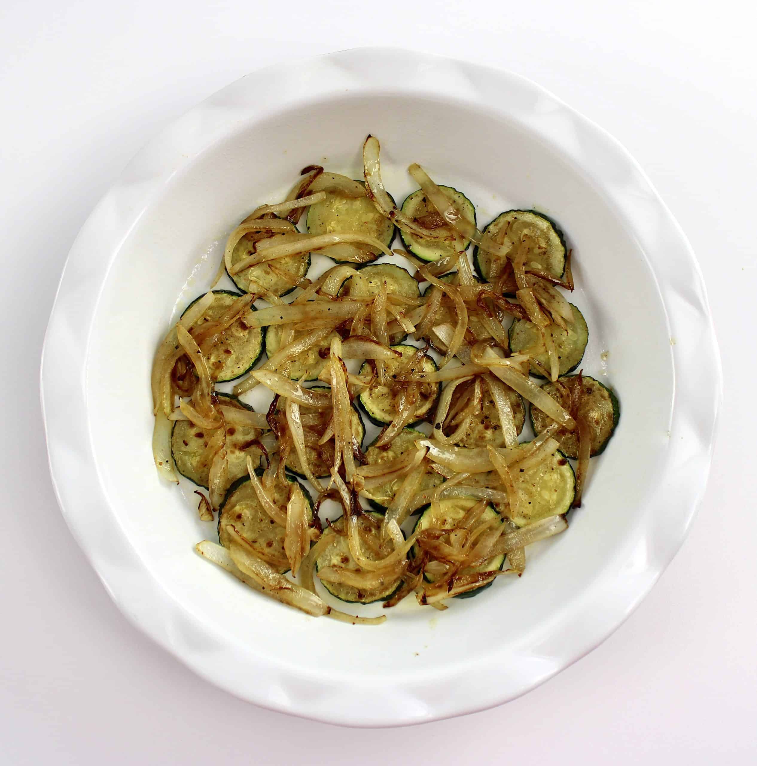 Sauteed zucchini and onions in pie dish