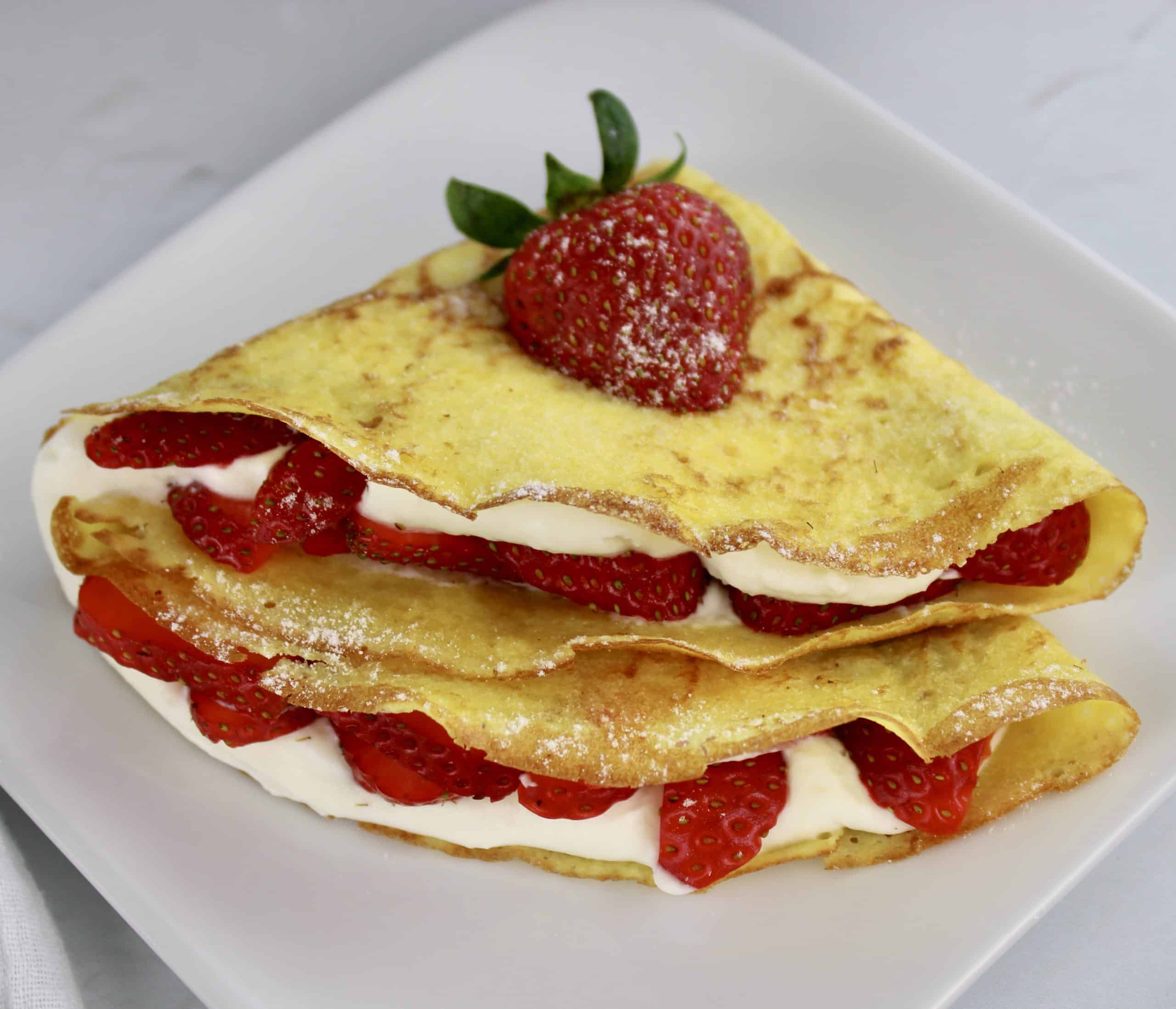 crepe with strawberries and cream