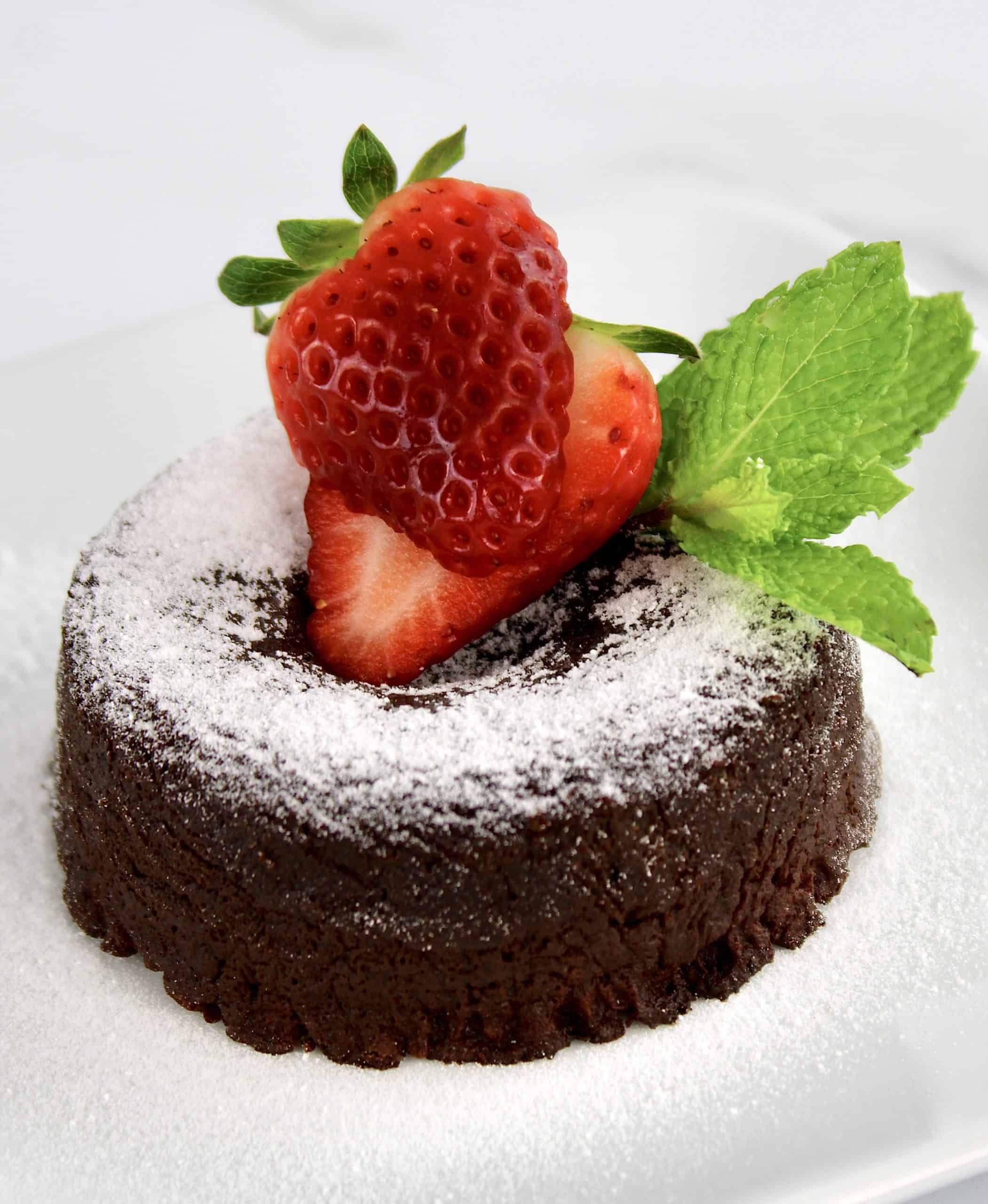 lava cake with strawberry and mint on top