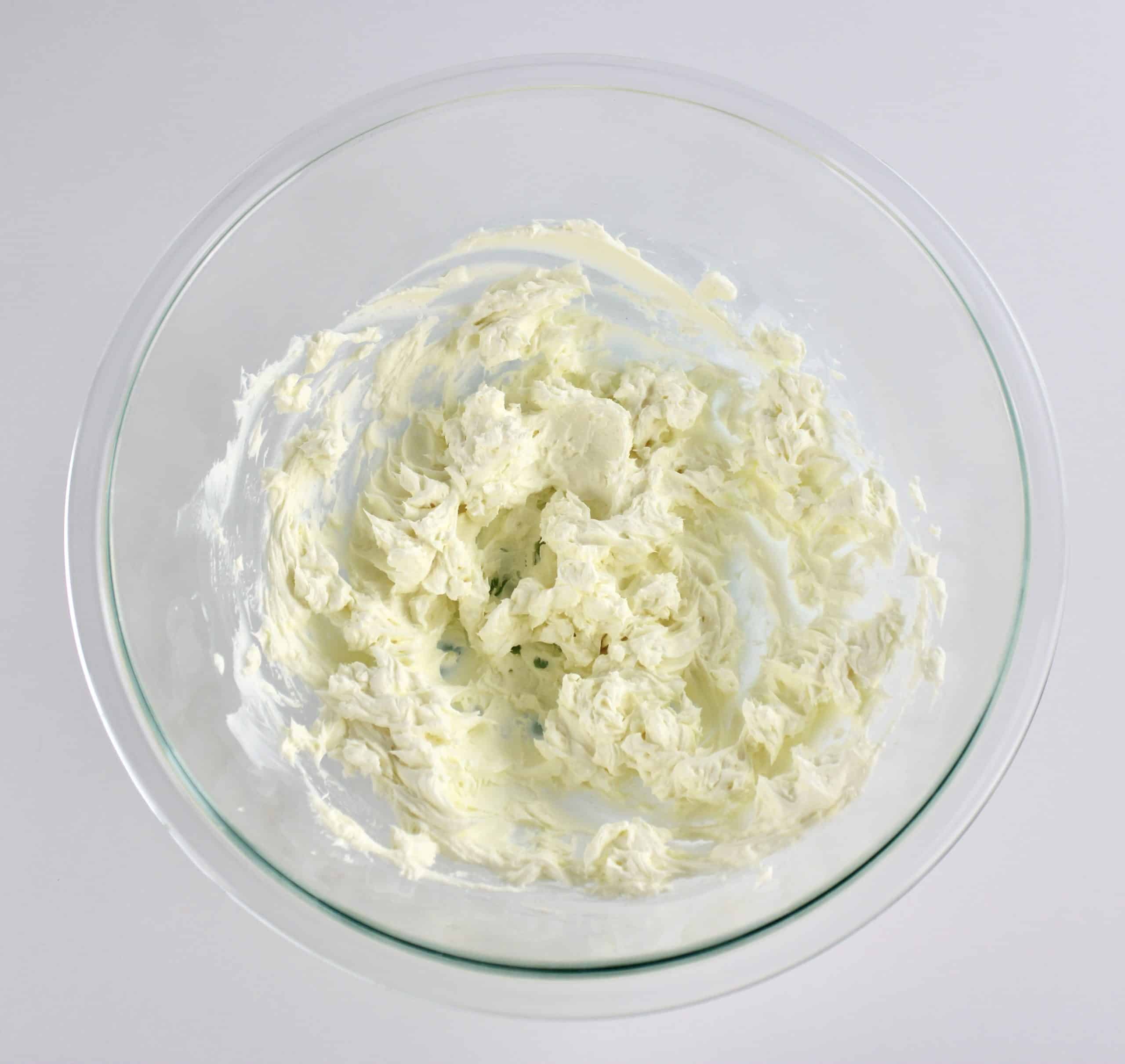 cream cheese whipped in glass bowl