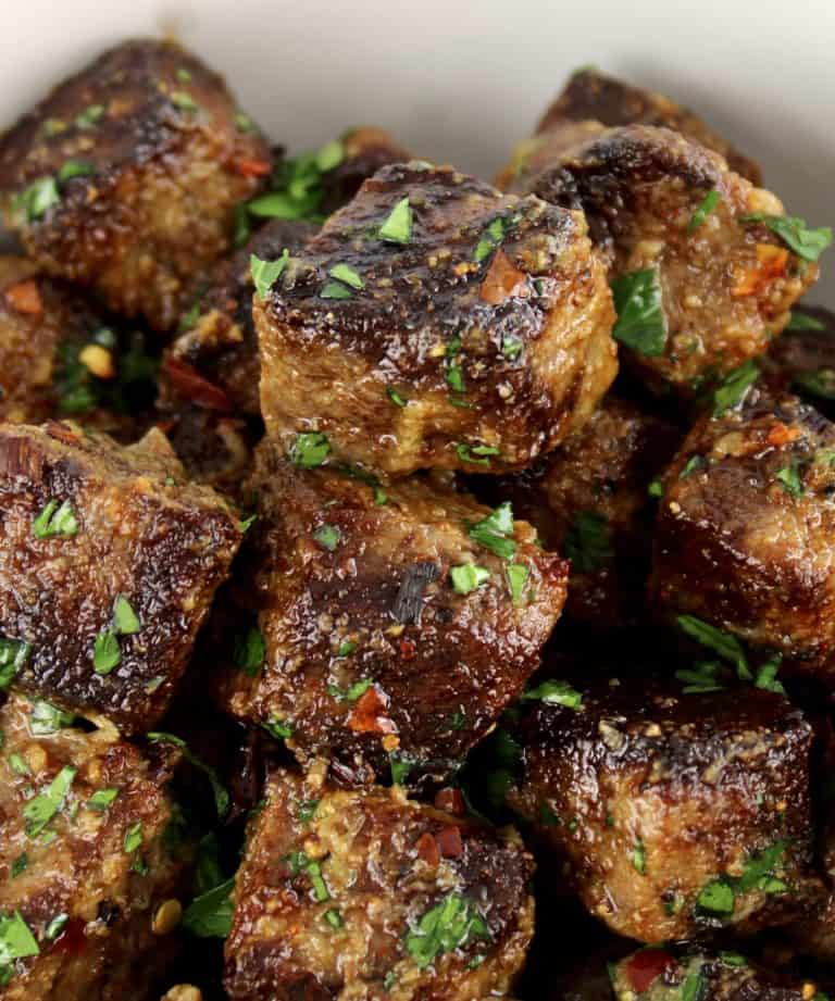 Air Fryer Steak Bites with parsley garnish