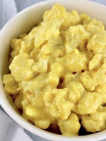 overhead view of Cauliflower Mac and Cheese in white bowl
