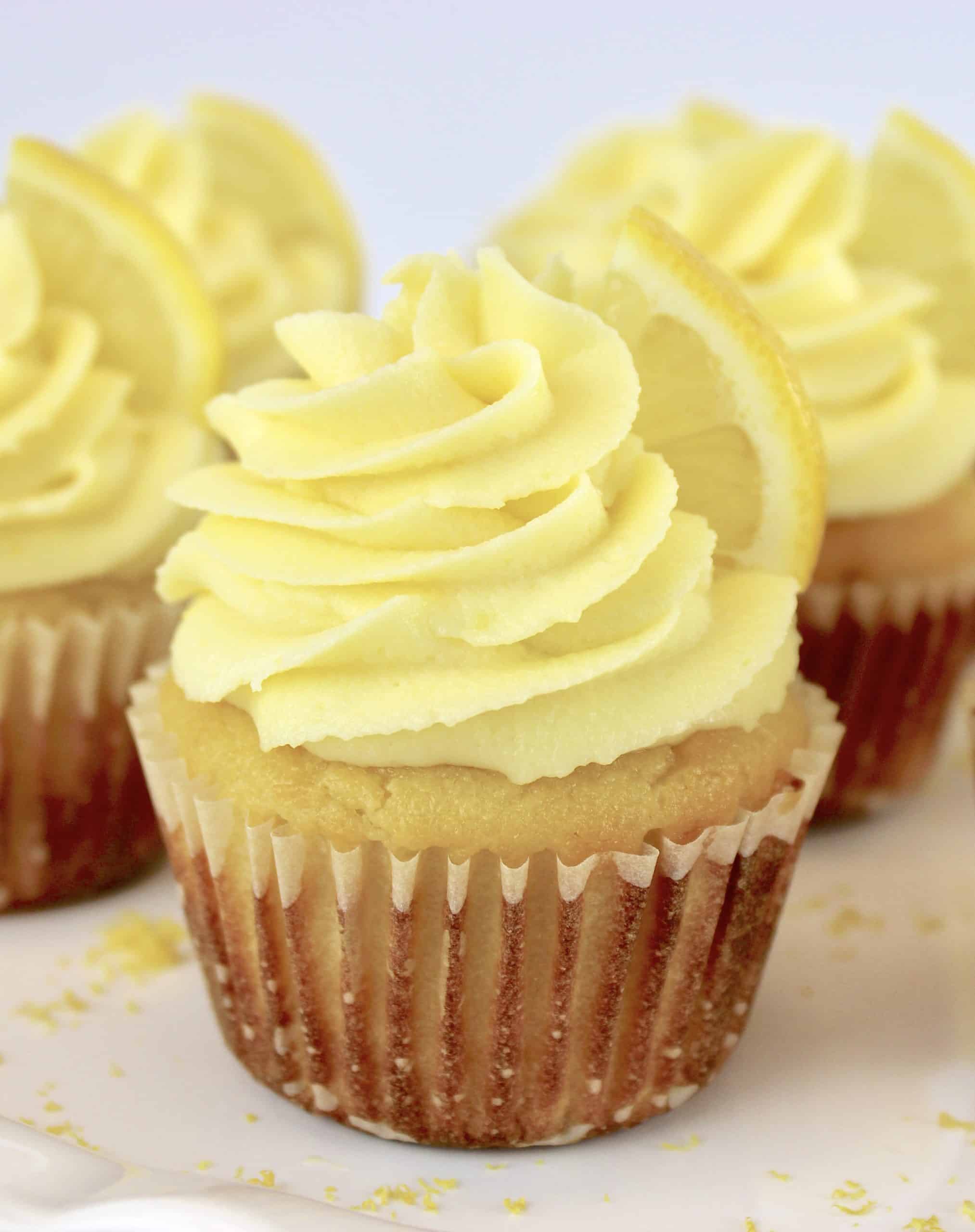 Keto Lemon Cupcakes with lemon slice on side