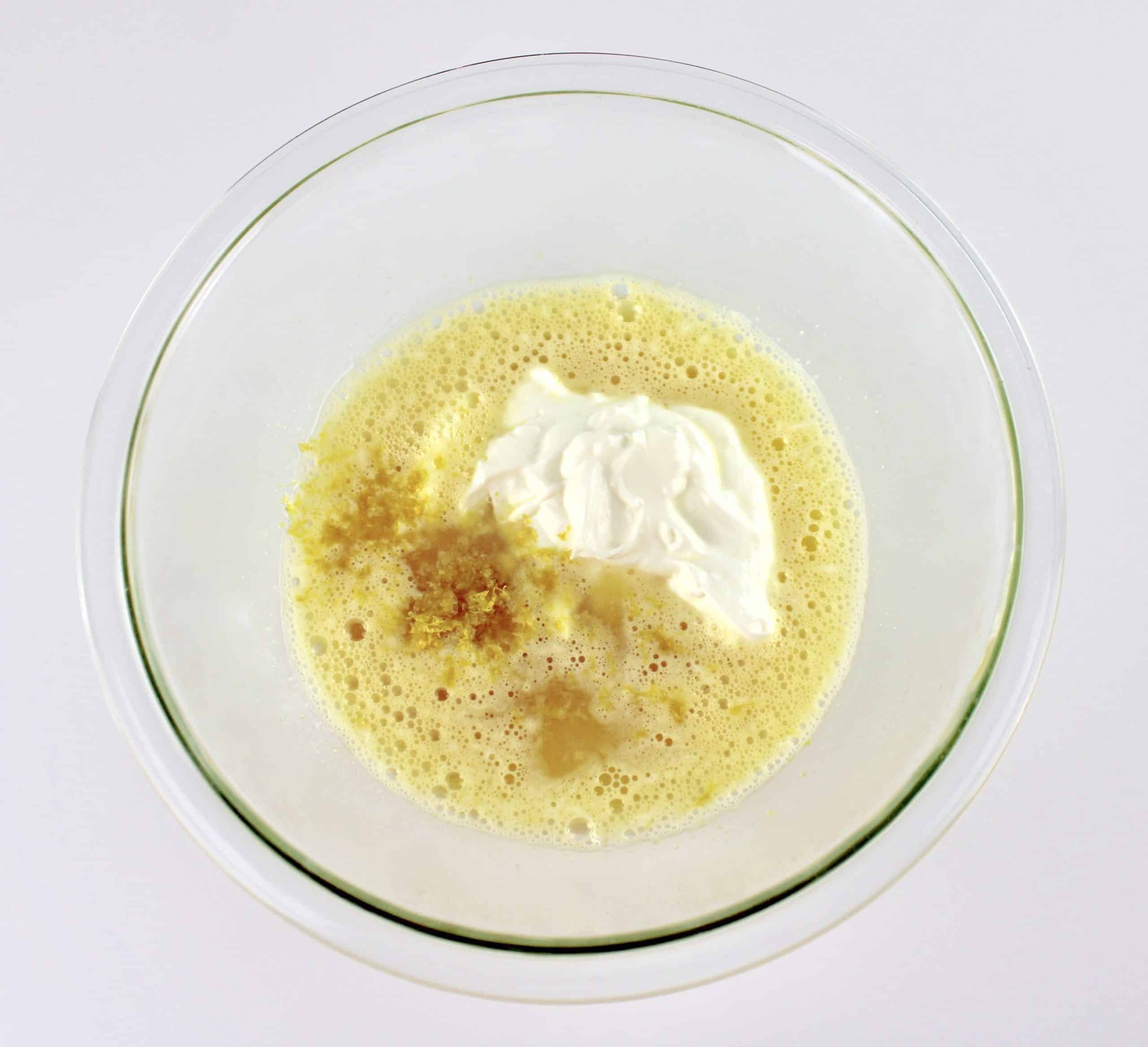 eggs sour cream and lemon in mixing bowl unmixed