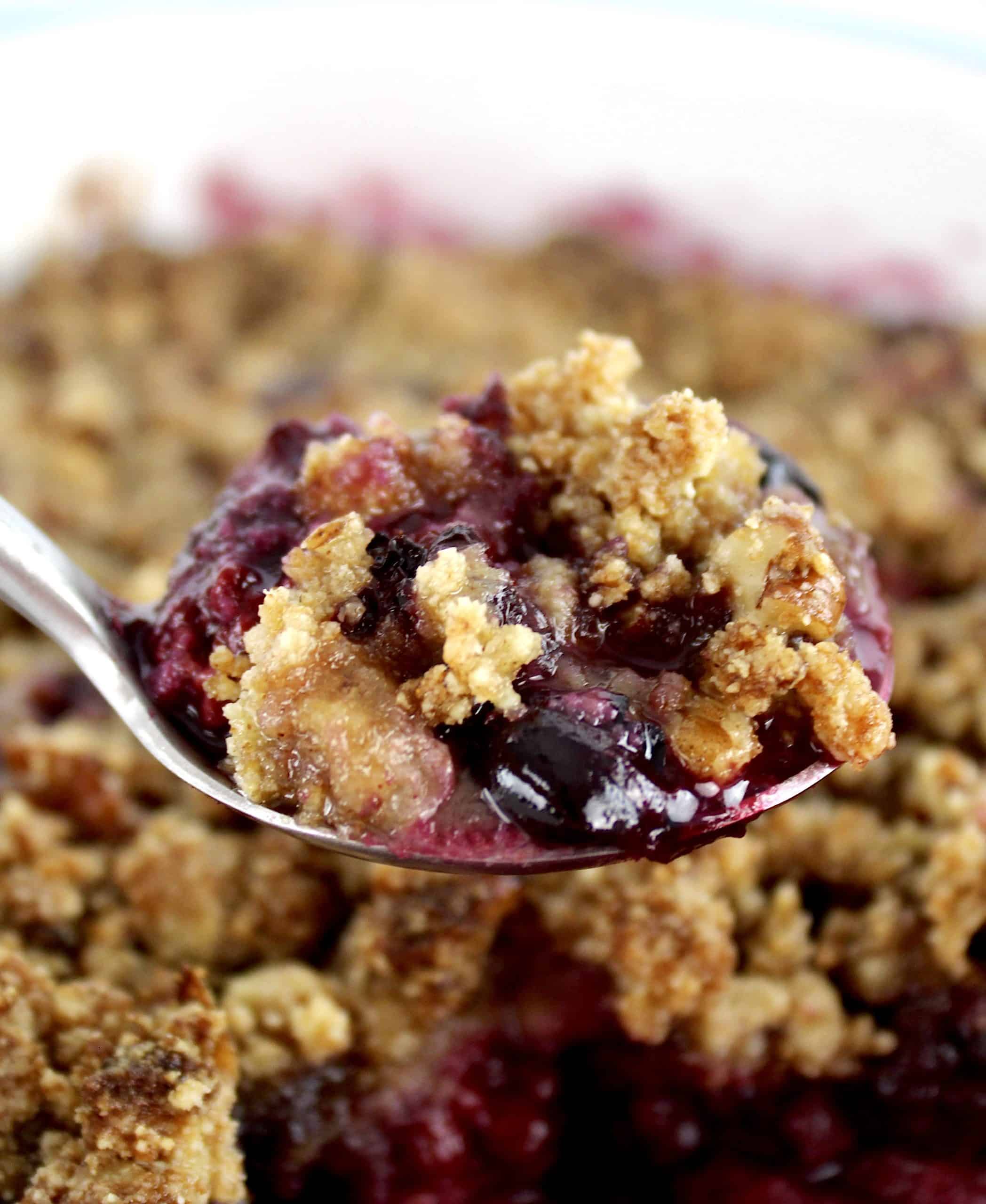 closeup of spoonful of Mixed Berry Crumble