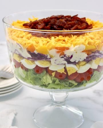 Overnight 7 Layer Salad in glass trifle bowl