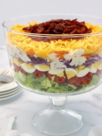 Overnight 7 Layer Salad in glass trifle bowl