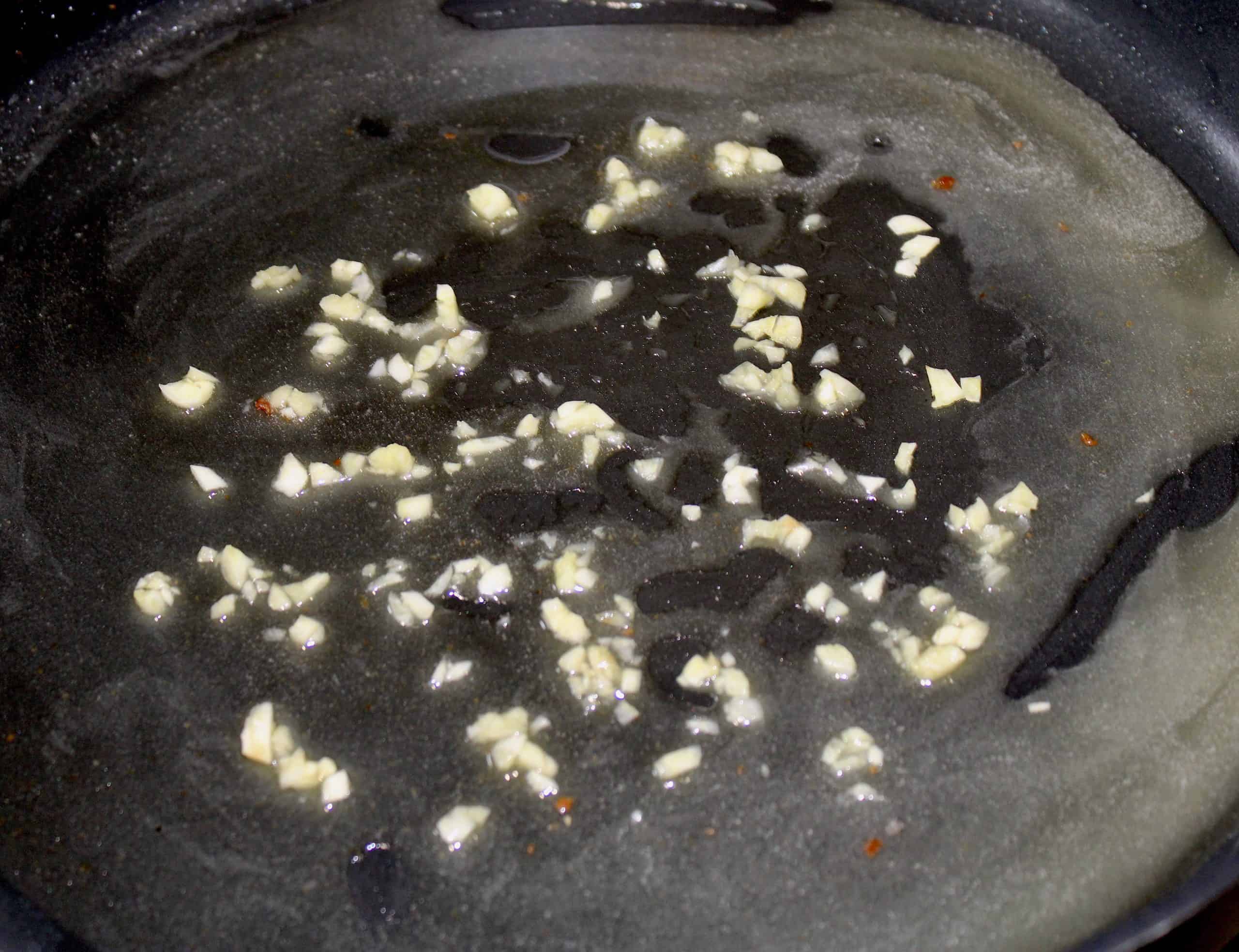minced garlic in skillet