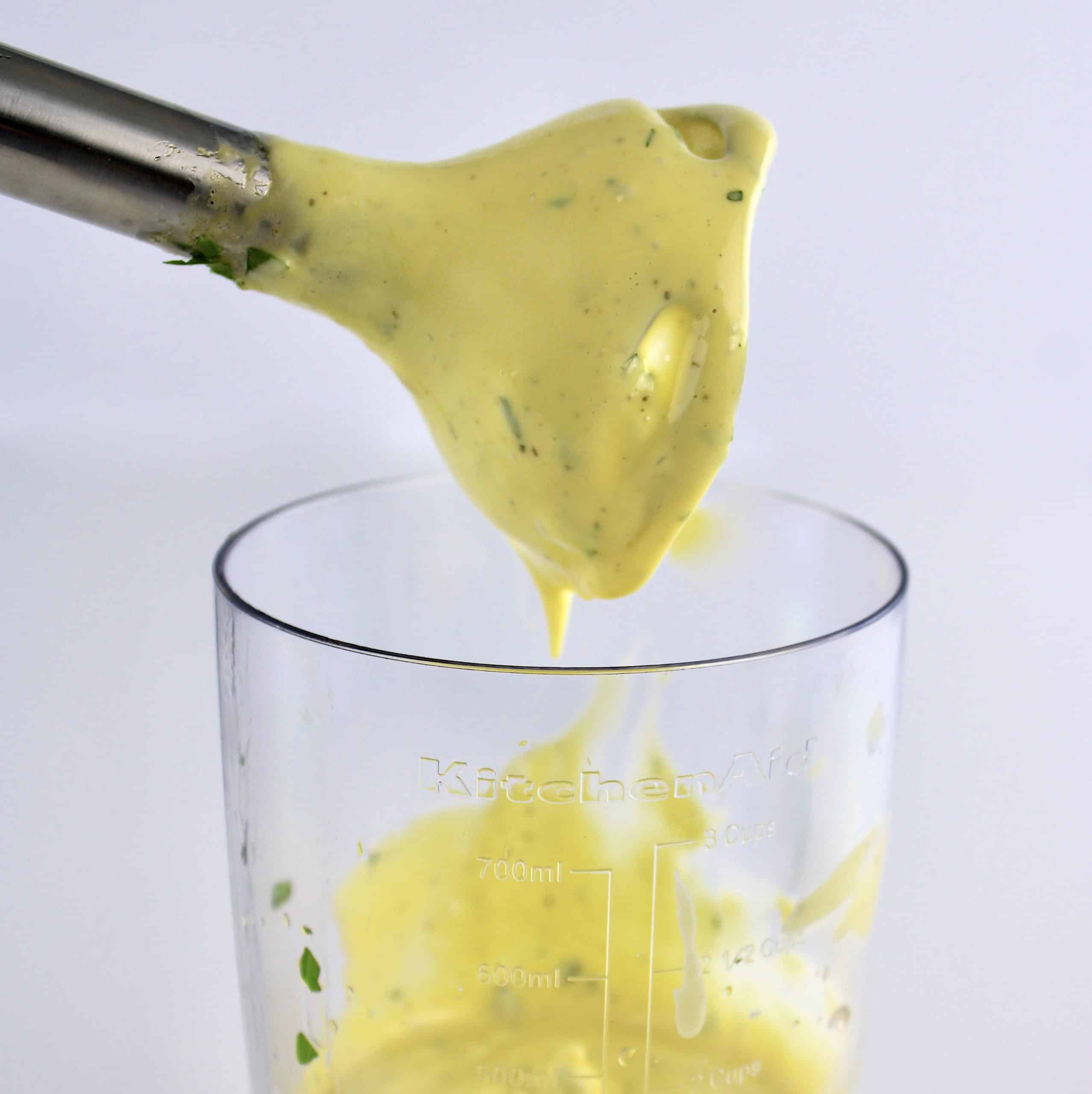 Béarnaise sauce dripping off immersion blender stick