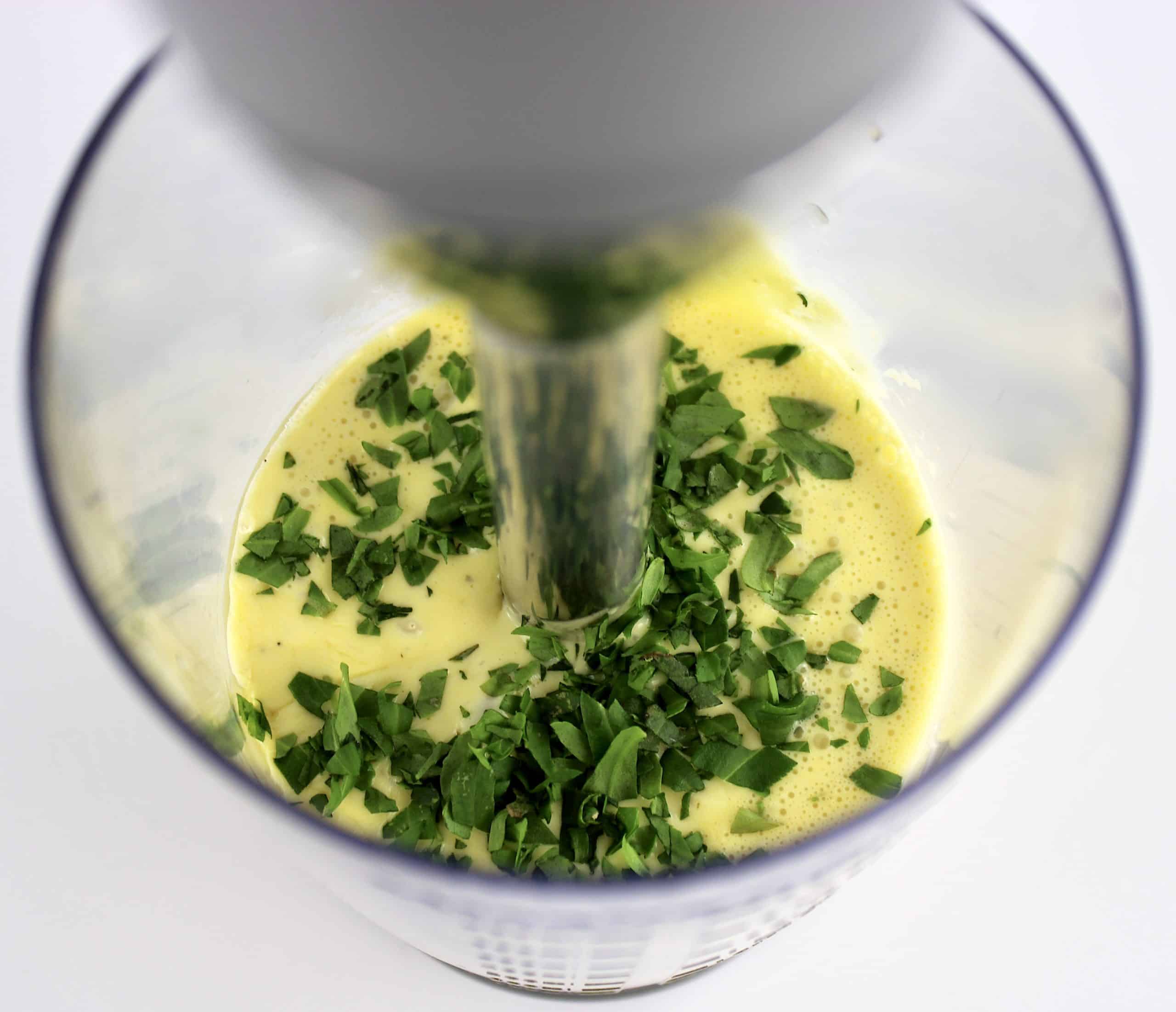 Béarnaise sauce with fresh chopped tarragon in immersion blender