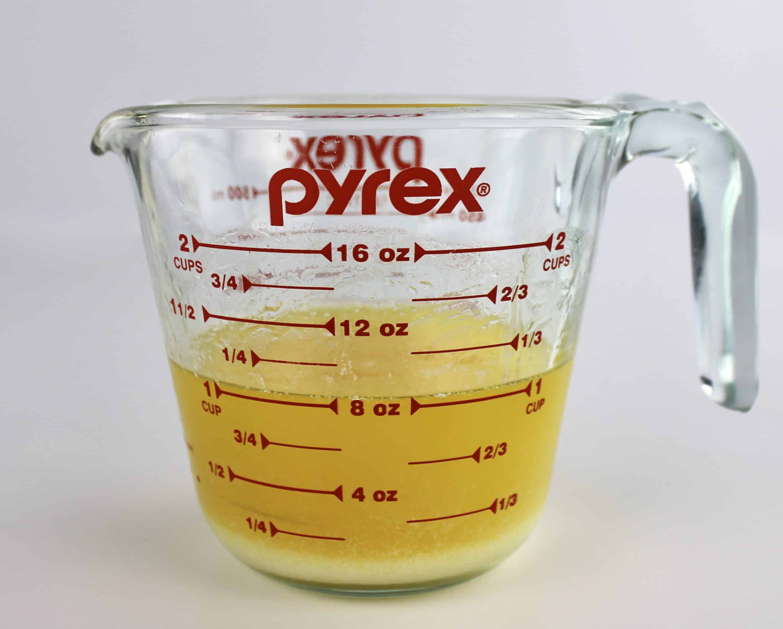 clarified butter in pyrex mixing cup