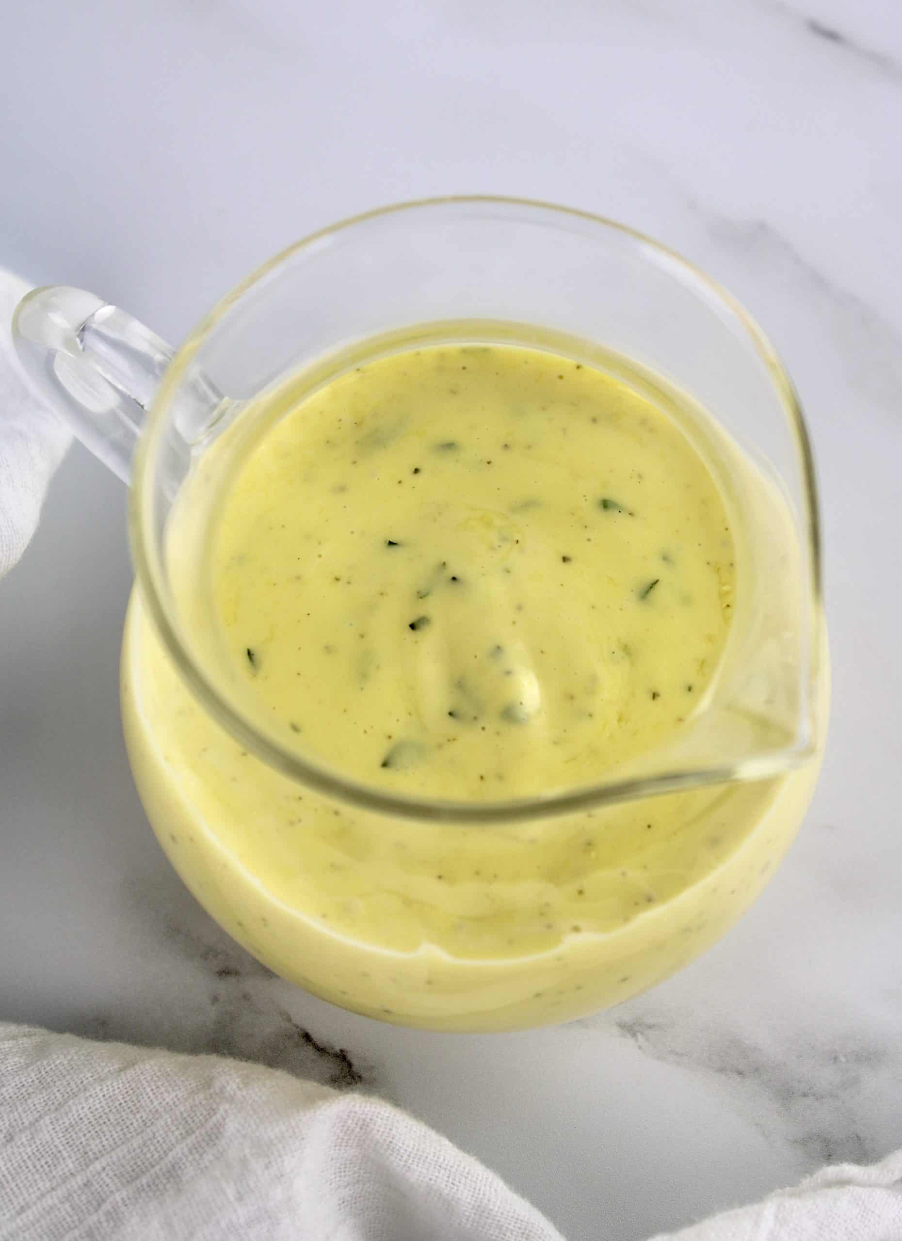 Béarnaise Sauce in glass jar with pour spout