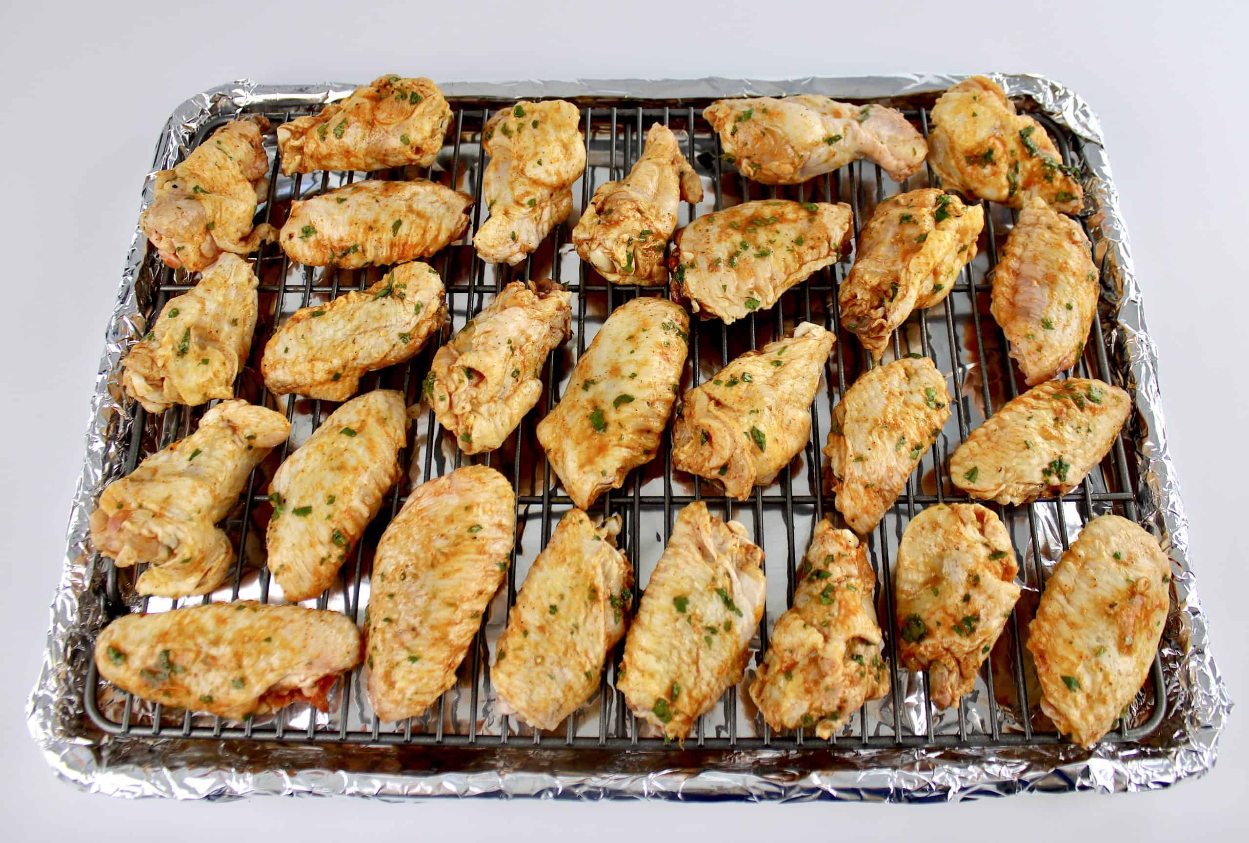 Cilantro Lime Chicken Wings unbaked on baking rack