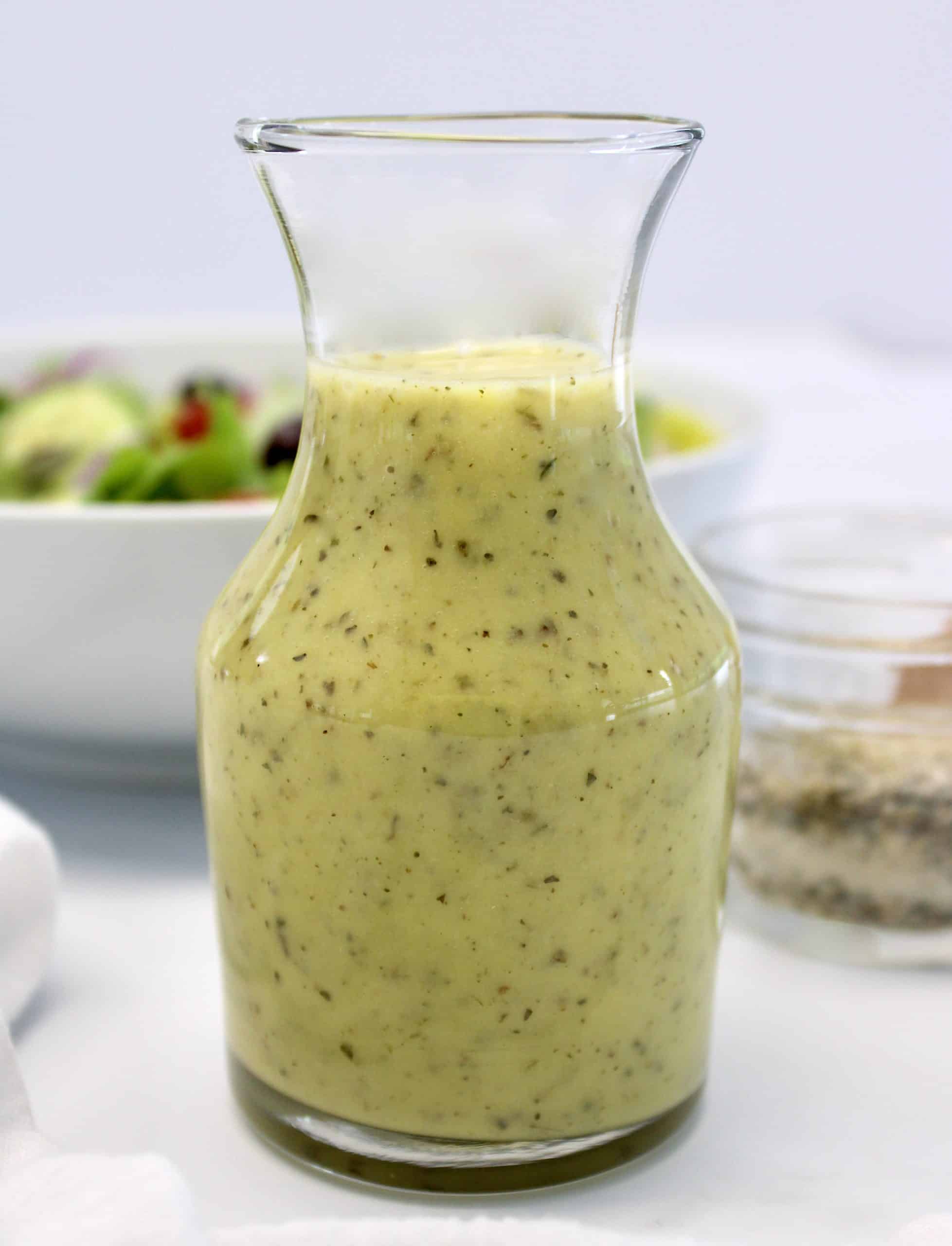 closeup of Homemade Italian Dressing in glass cruet