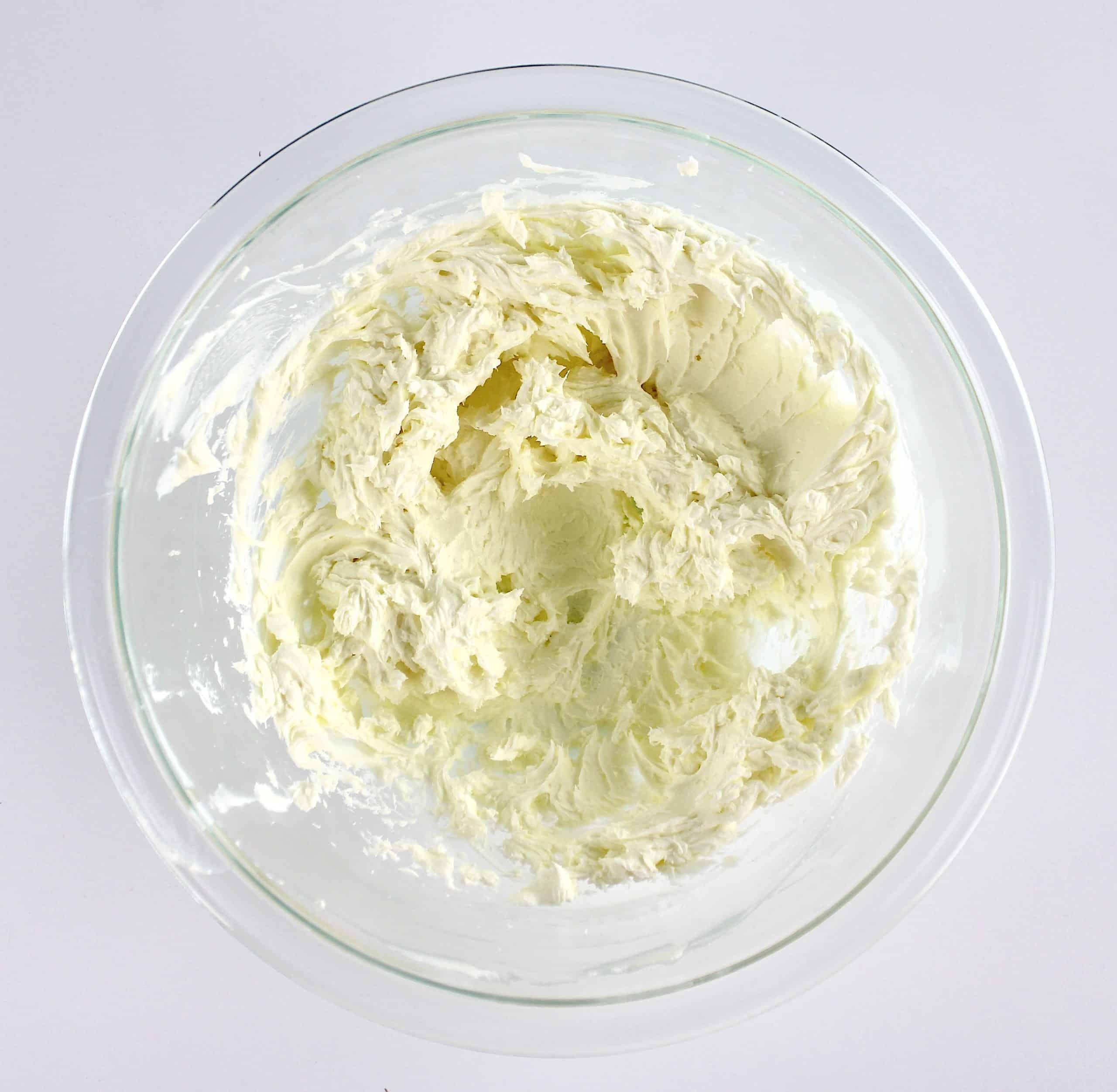 cream cheese whipped in glass bowl