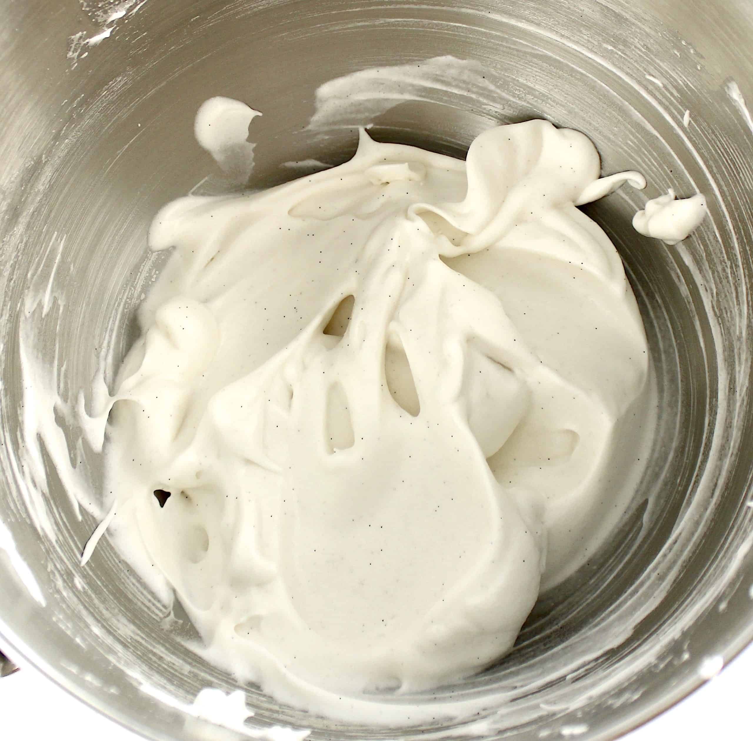 whipped vanilla meringue batter in stand mixer bowl