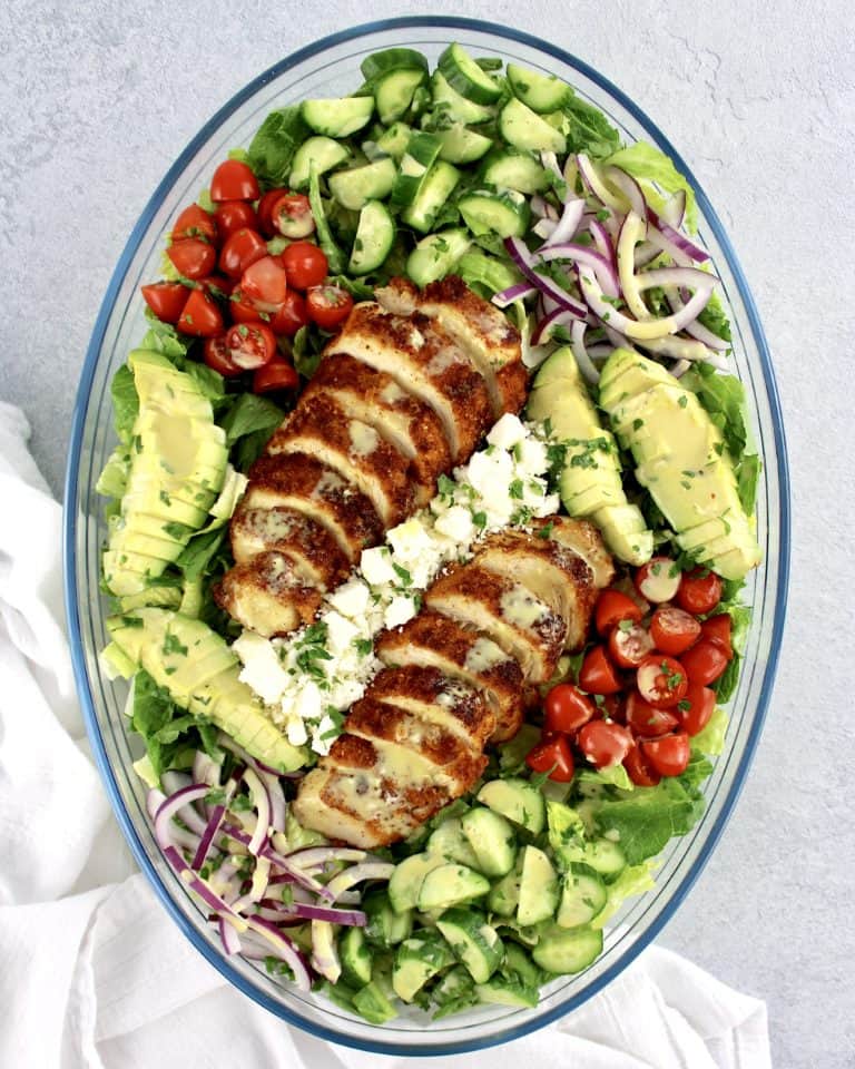 Crispy Chicken Salad with chopped veggies in glass bowl