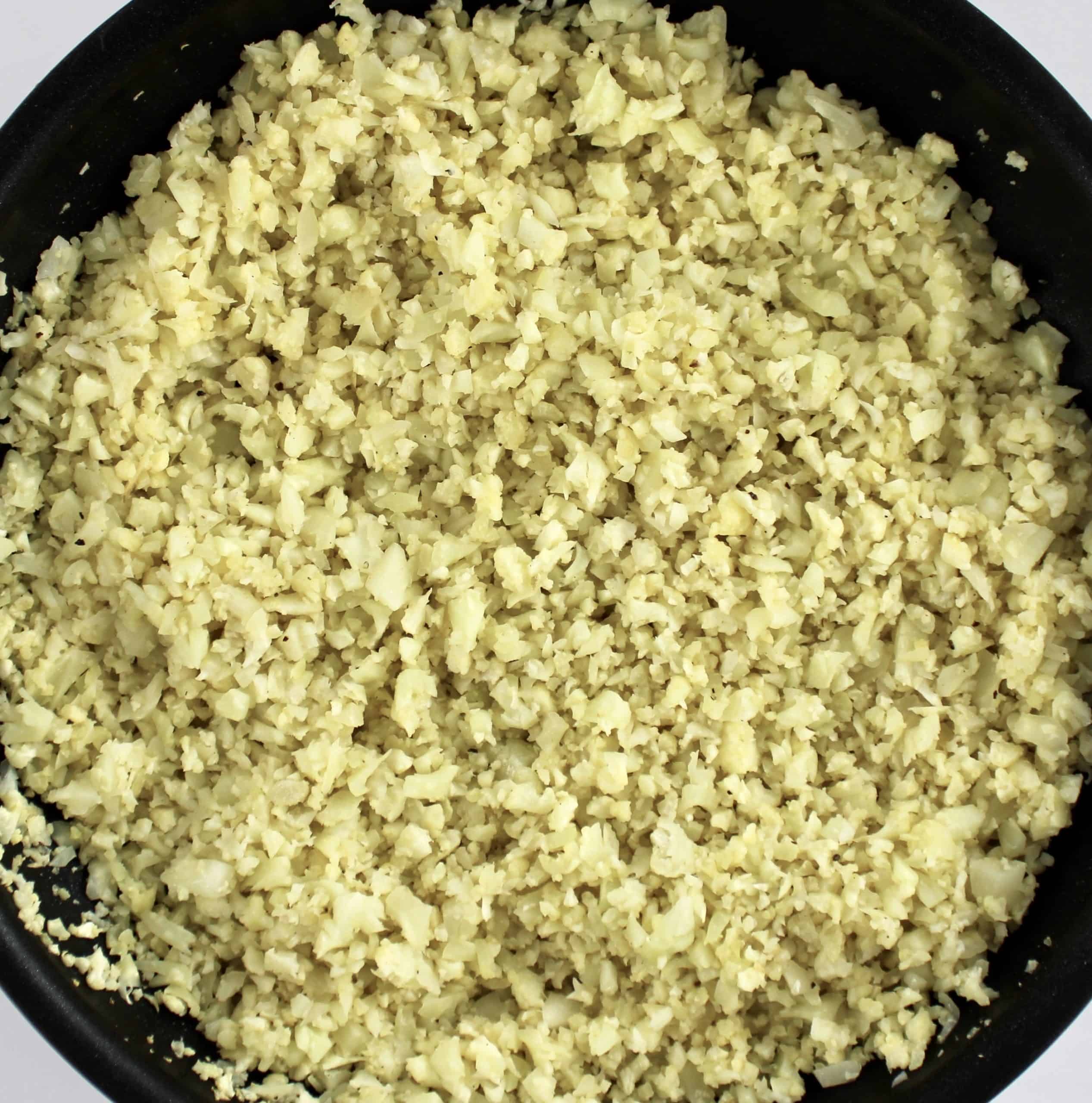 cooked cauliflower rice in skillet