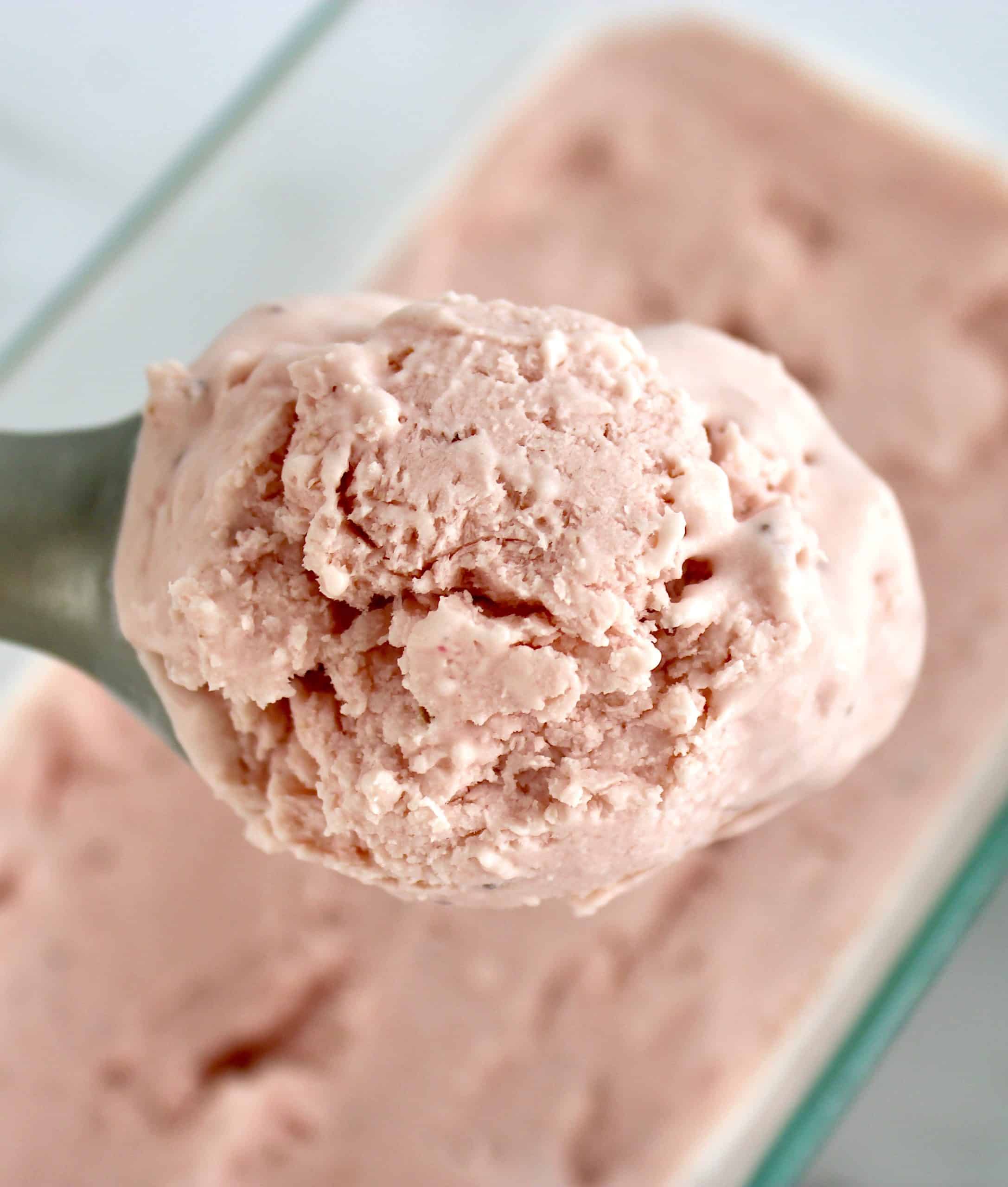 closeup of scoop of strawberry ice crean
