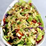 closeup of Thai Crunch Salad with Peanut Dressing in white bowl