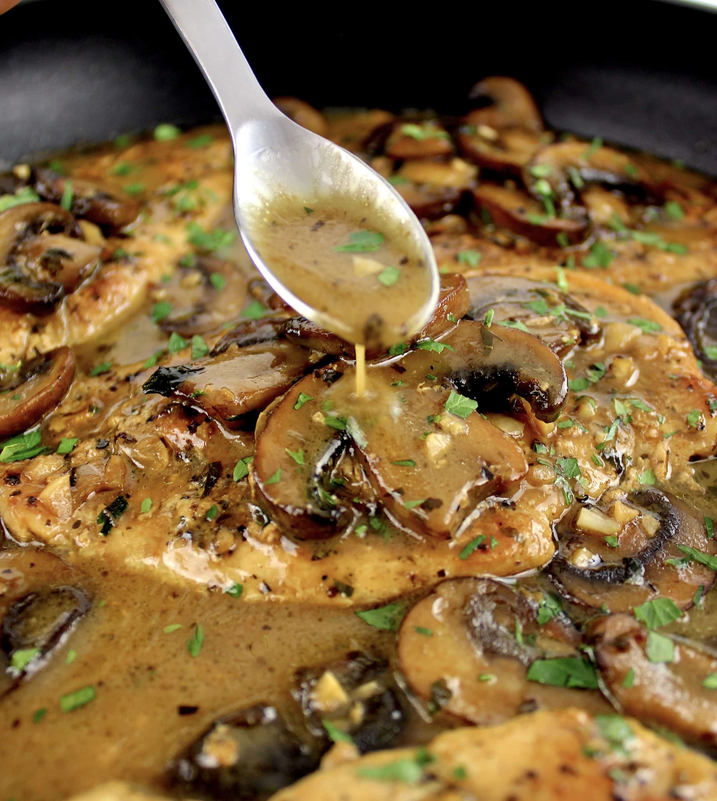 Creamy Chicken Marsala with spoon dripping sauce over top