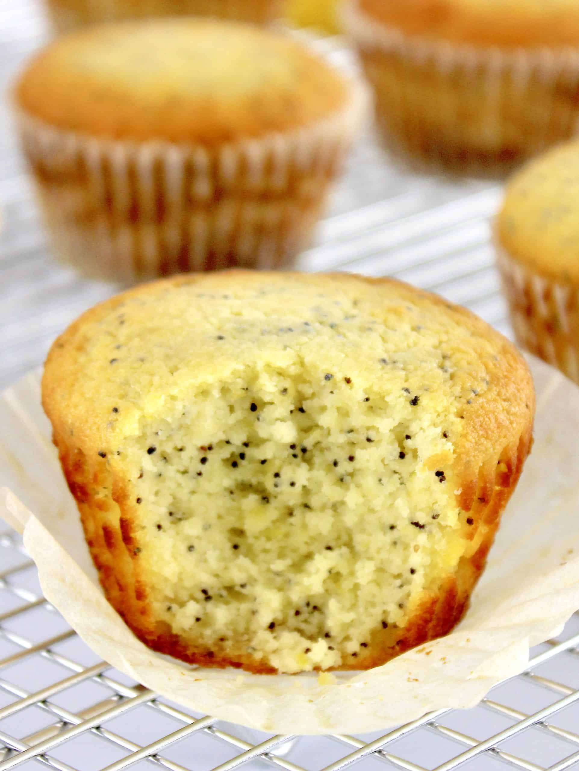 closeup of Lemon Poppy Muffin with bite missing