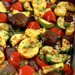 Oven Roasted Vegetables on sheet pan with chopped parsley on top
