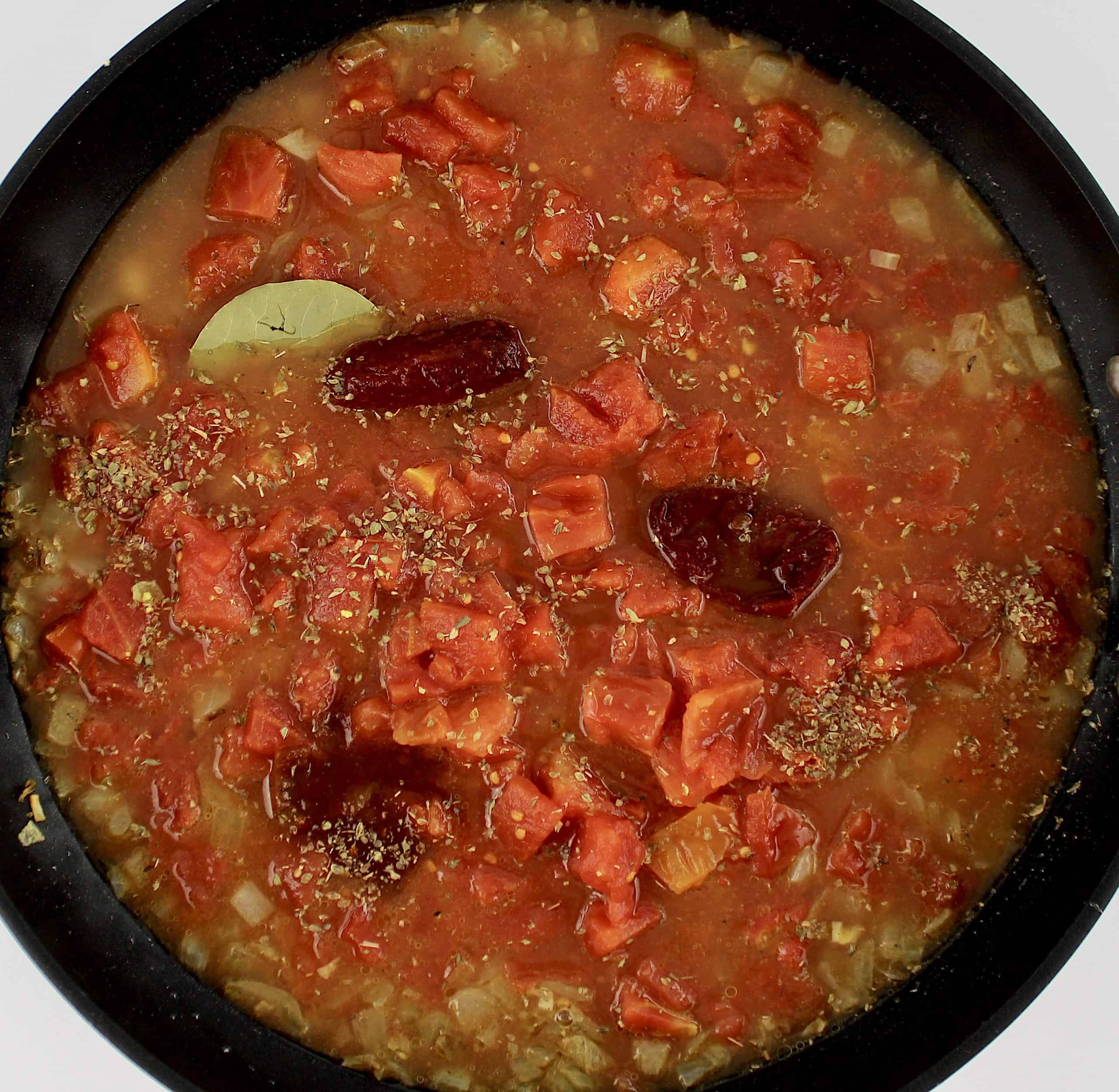 Chicken Tinga sauce uncooked in skillet
