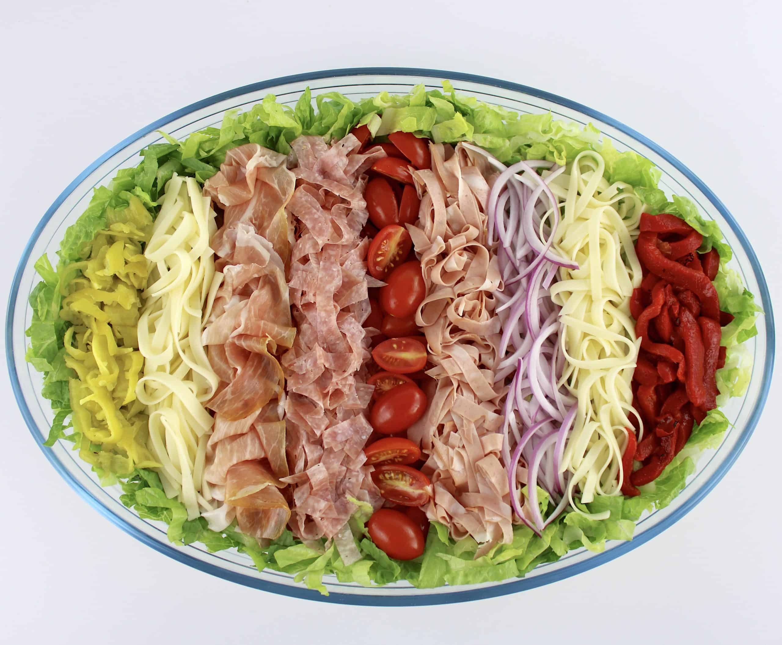 Grinder Salad in oval bowl arranged in rows