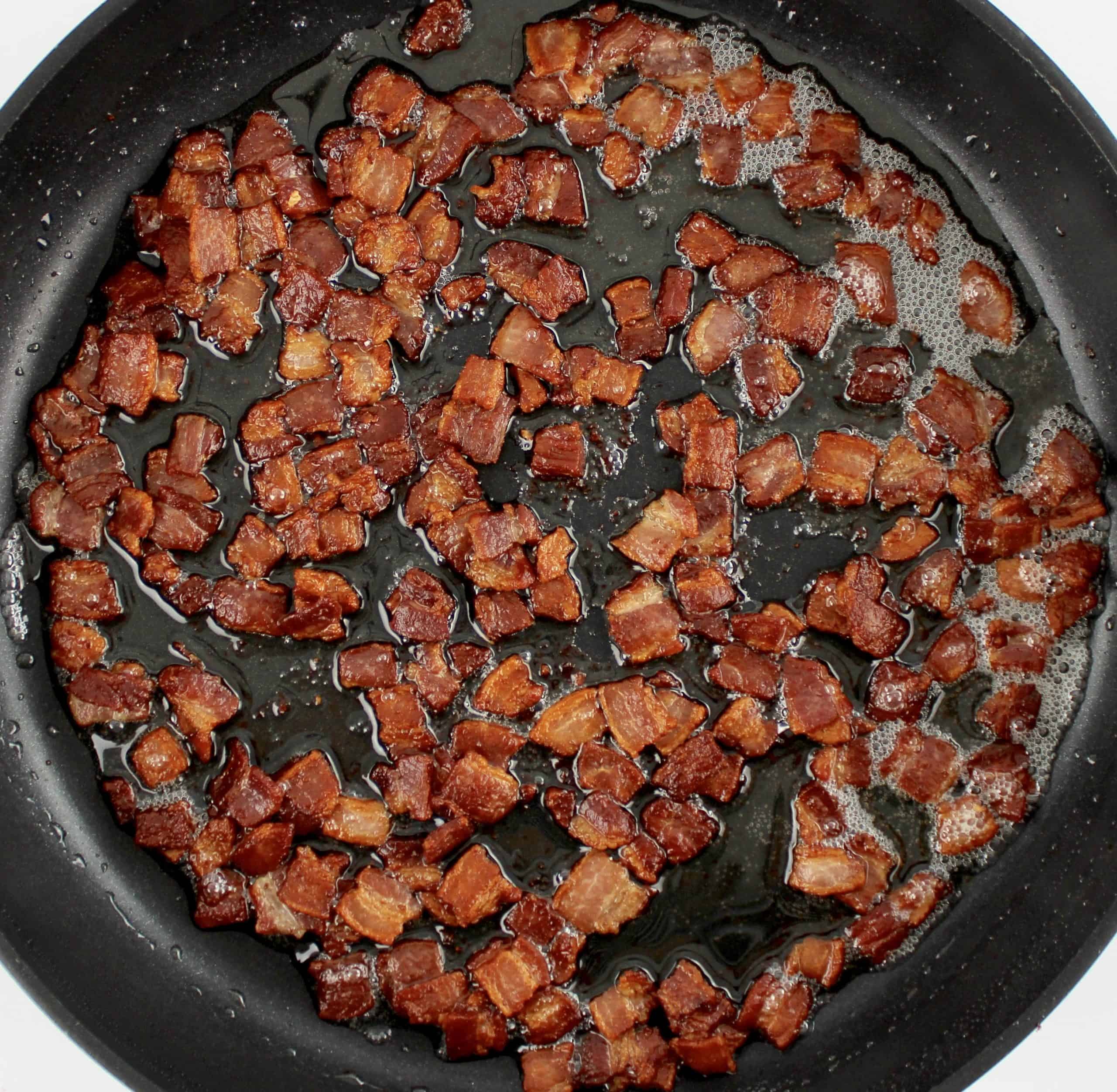chopped cooked bacon in skillet